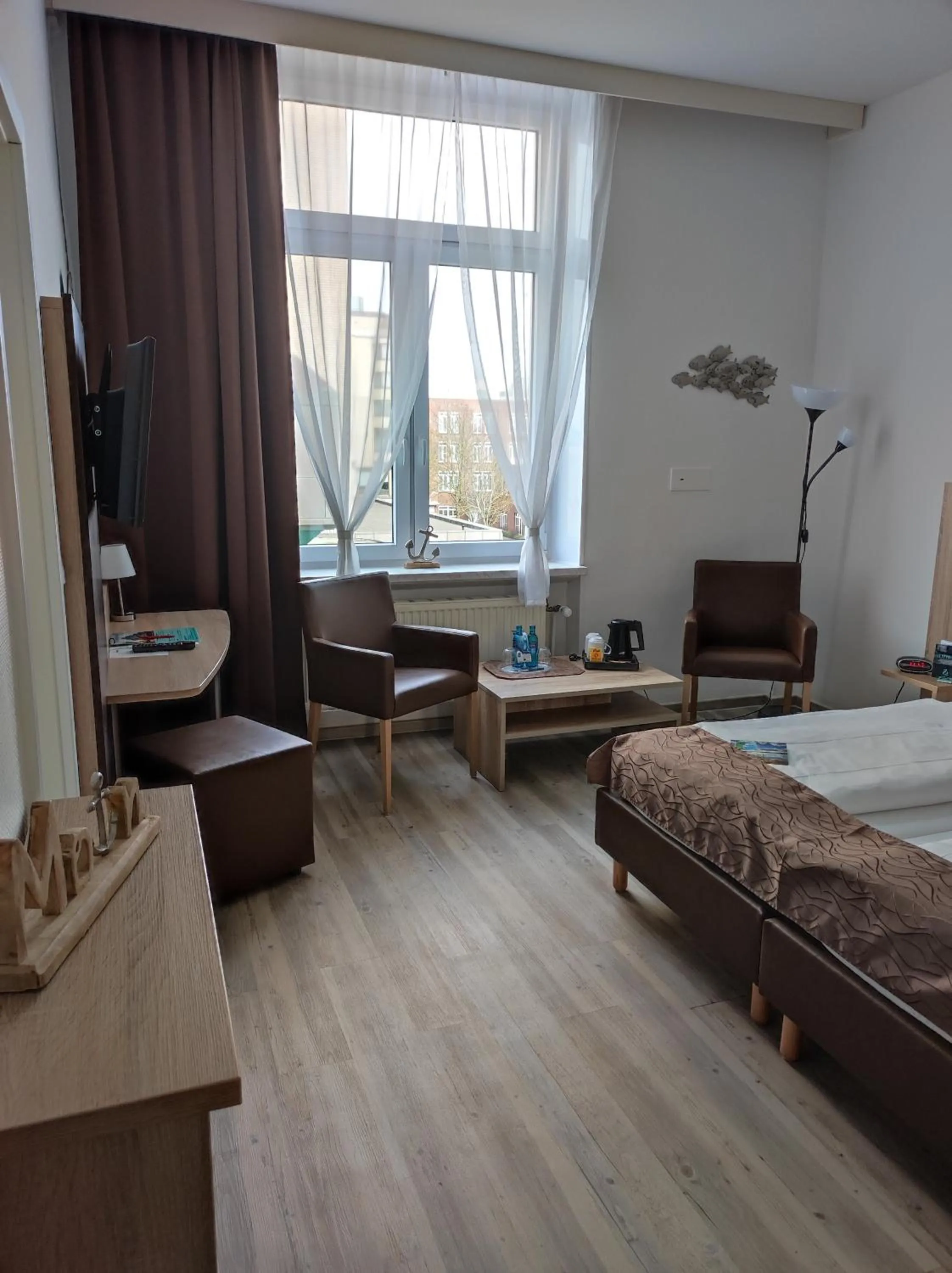 Photo of the whole room, Bed in Nordsee Hotel Borkum