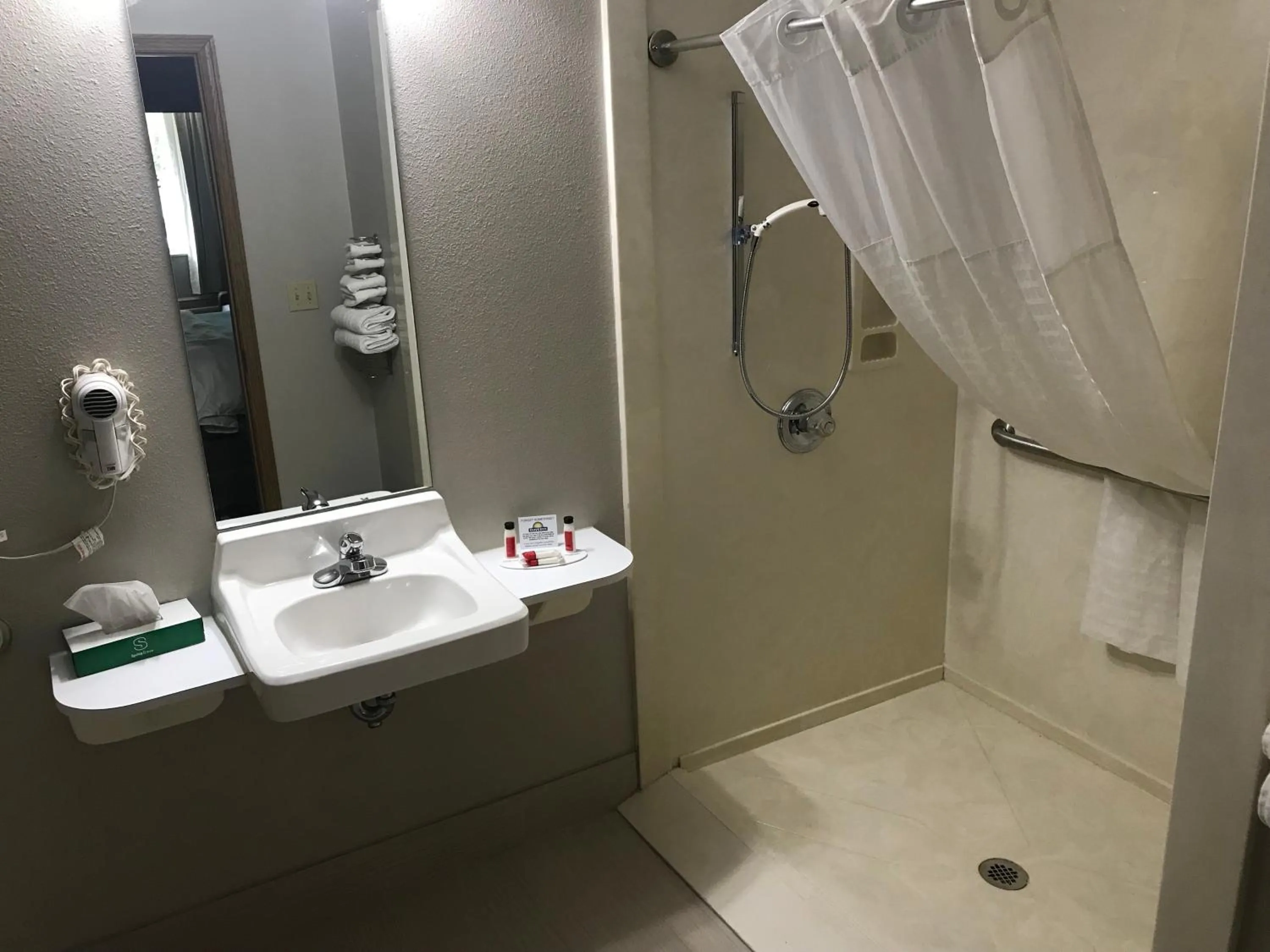 Bathroom in Days Inn by Wyndham Grove
