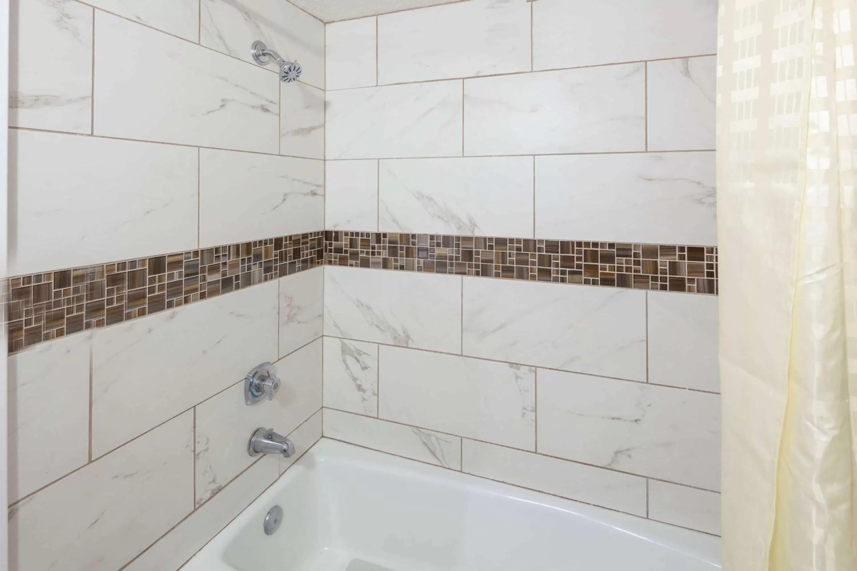 Bathroom in Travelodge by Wyndham Harbor City