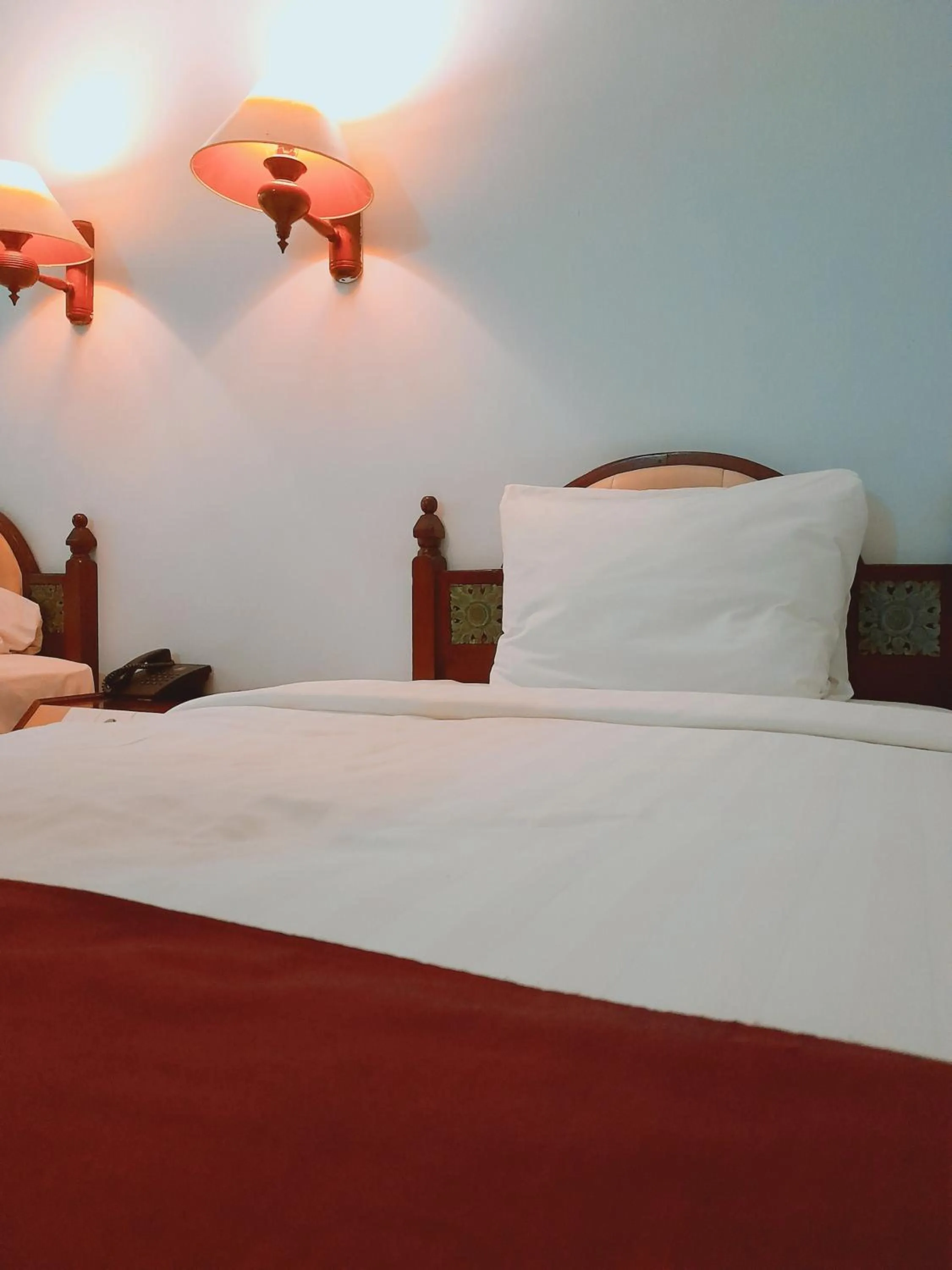 Bed in Puri Saron Senggigi Hotel