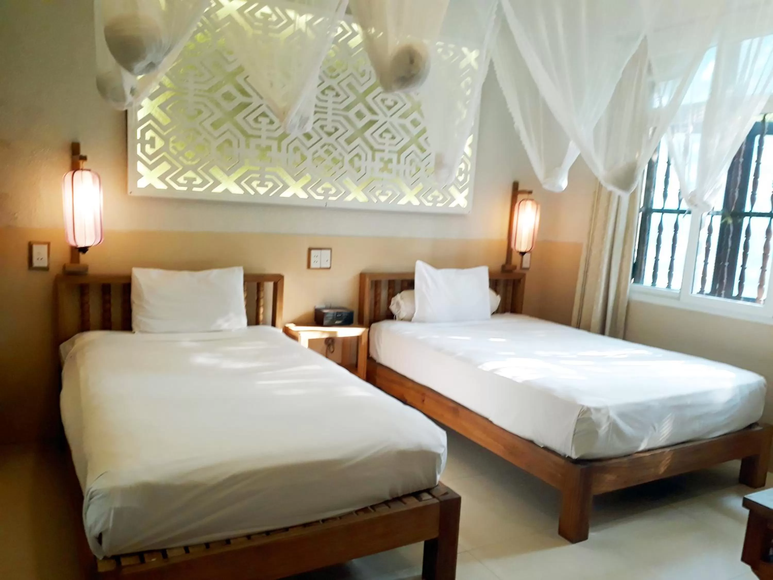 Bed in Hoi An Pho Library Hotel