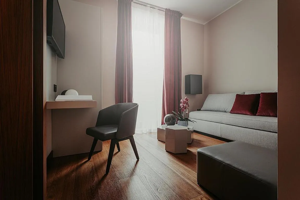 Bed in Bacã Suites, Restaurant & Bar