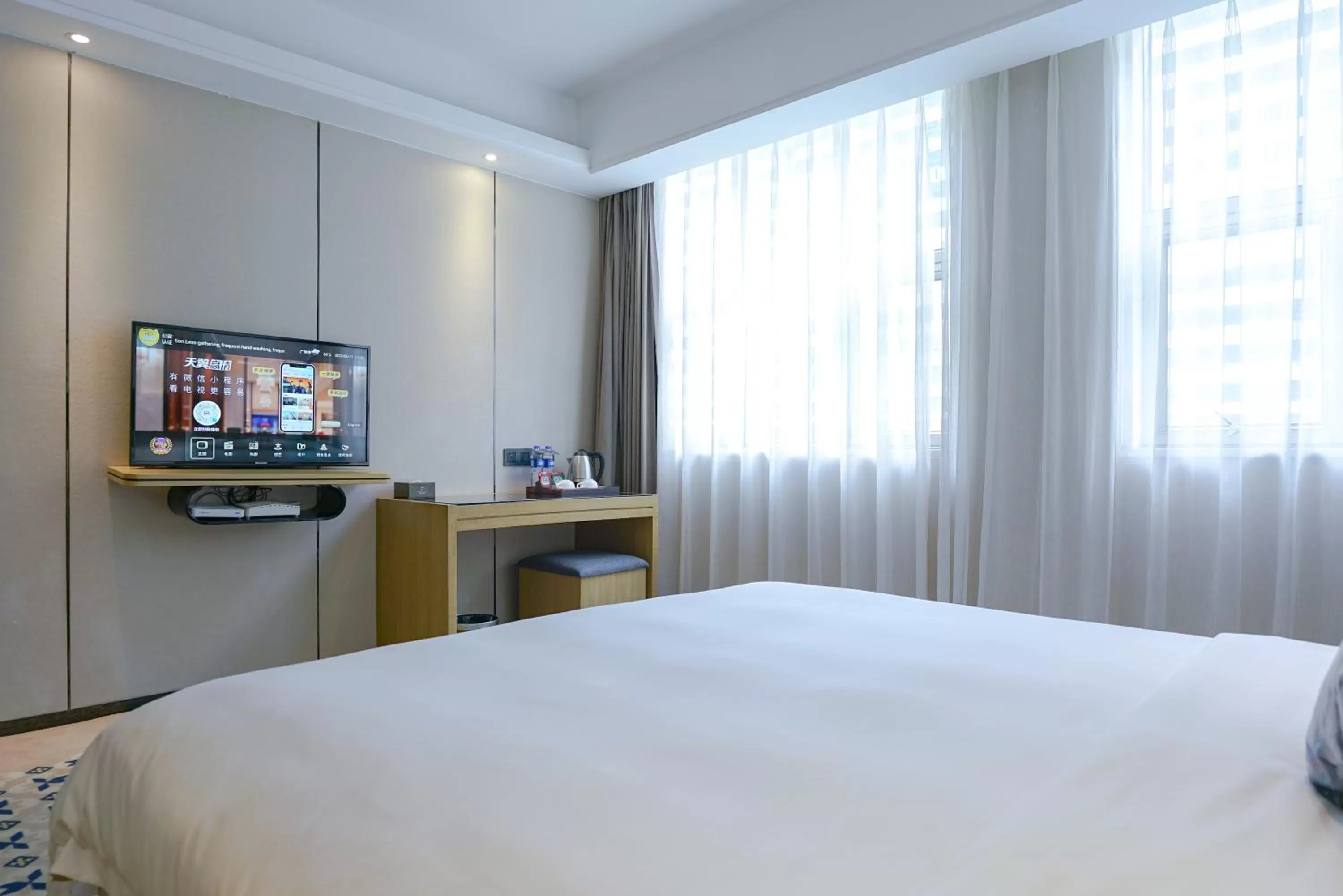 Bed in Paco Hotel Tiyuxilu Metro Guangzhou-Free Shuttle Bus fir Canton Fair