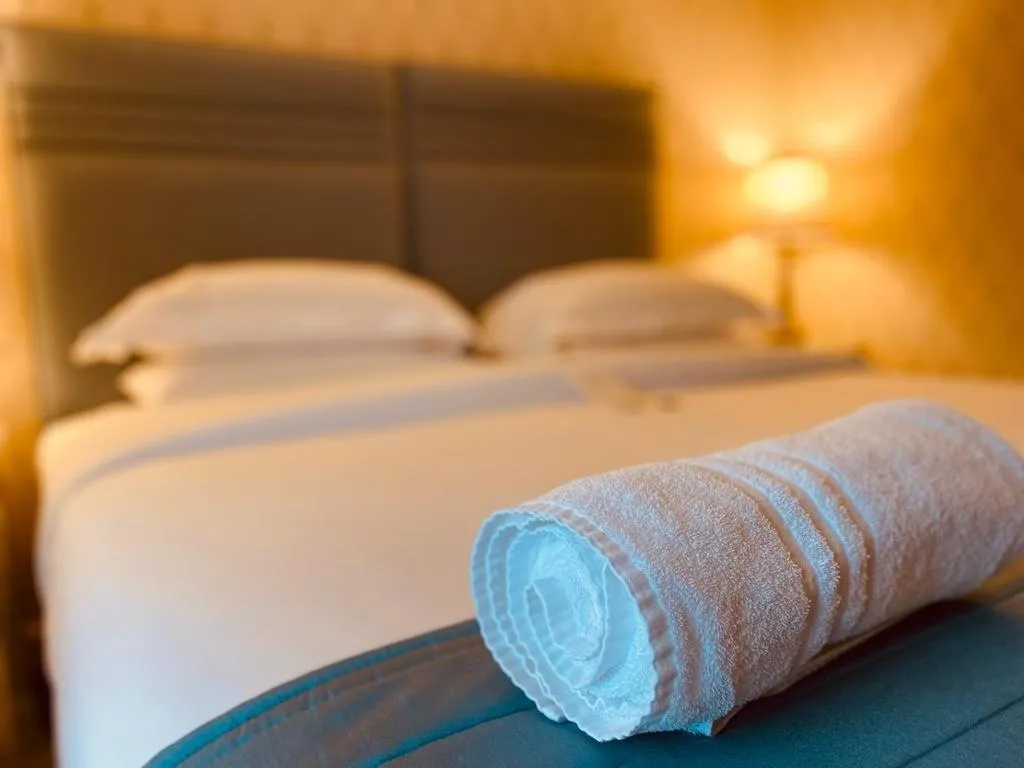 Bed in Le Bouchon Brasserie & Hotel