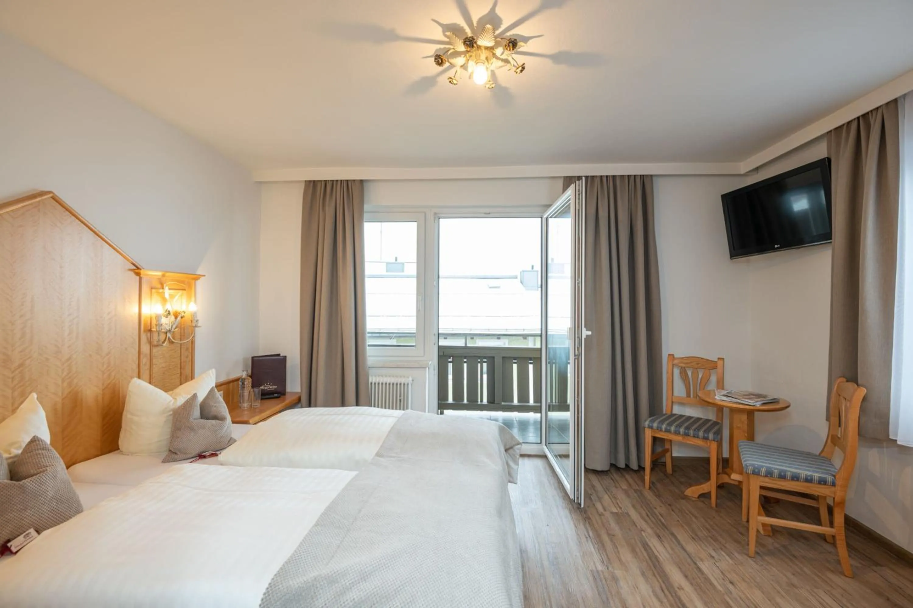 Photo of the whole room, Bed in Hotel Stegerbräu