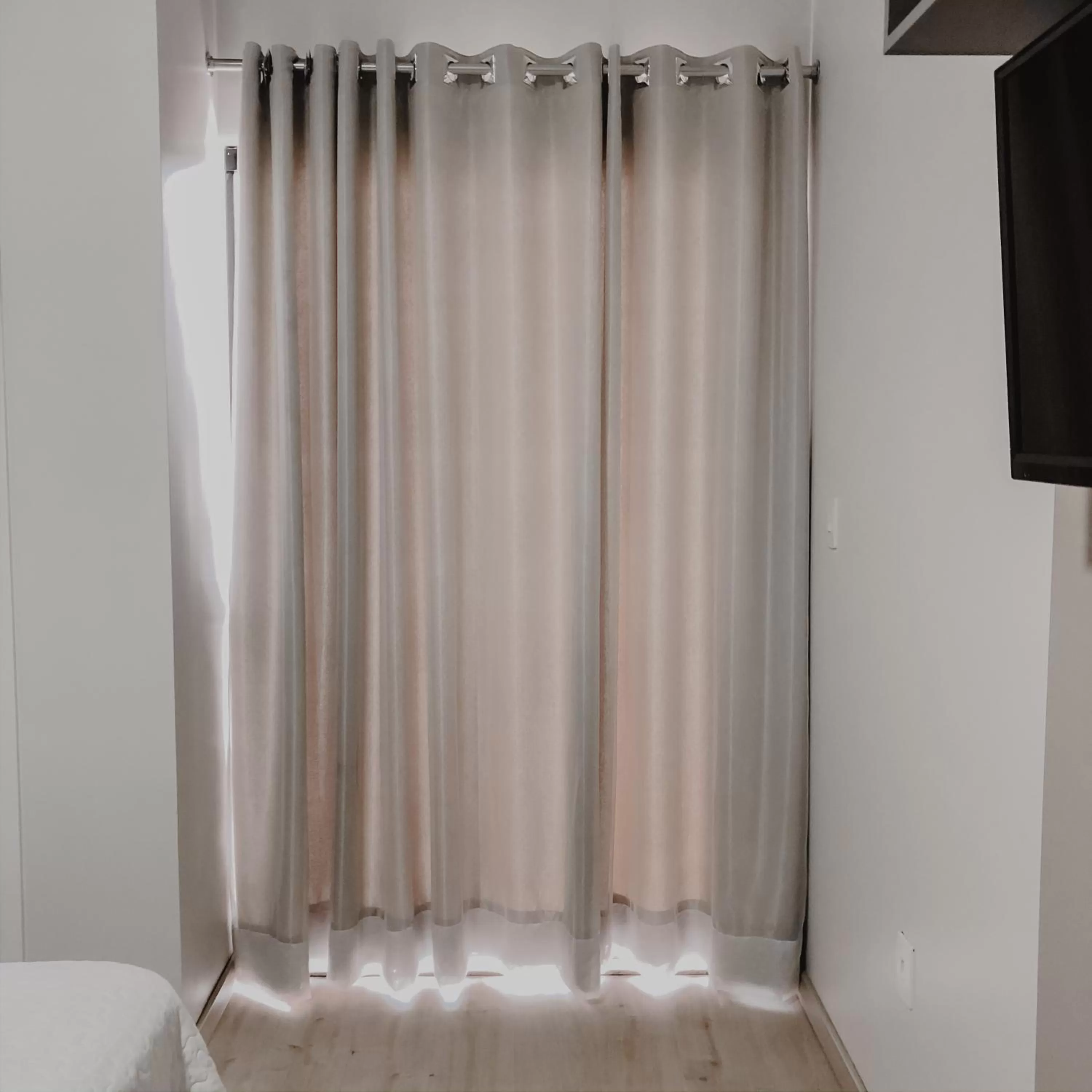 TV/Entertainment Center in Petri Plaza Hotel