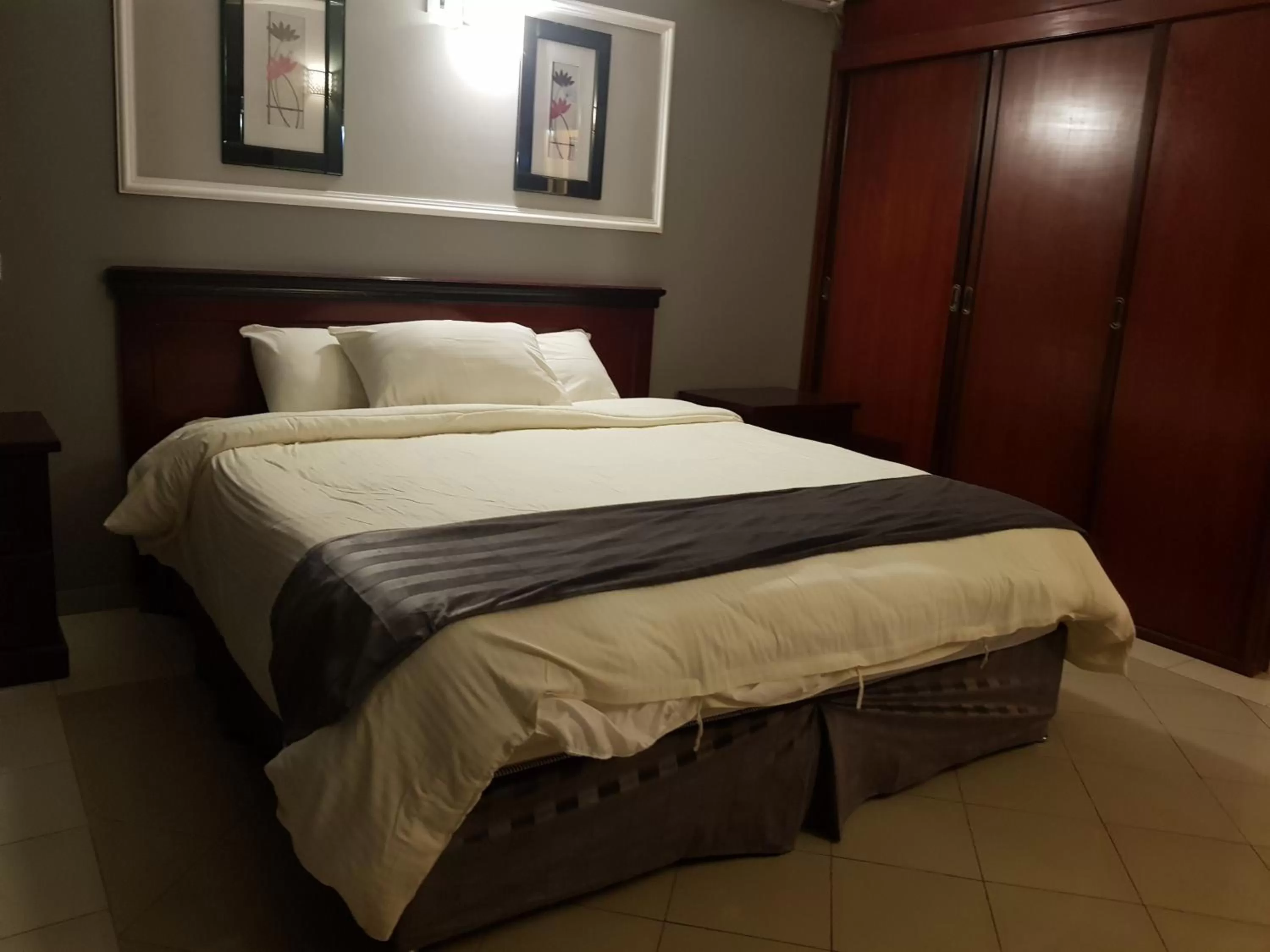 Bed in Almeswari Suites