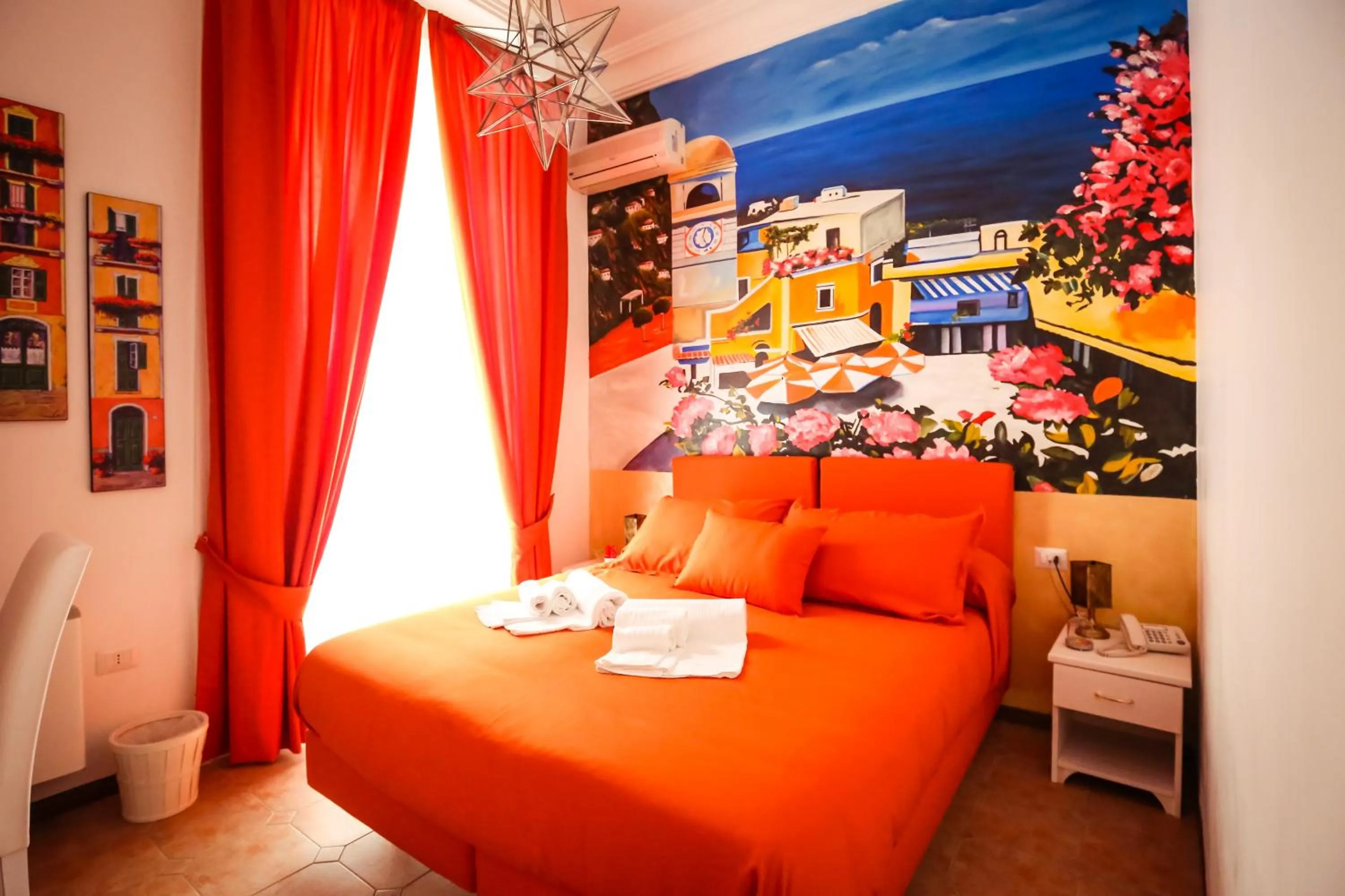 Bed in NapoliMia Boutique Hotel