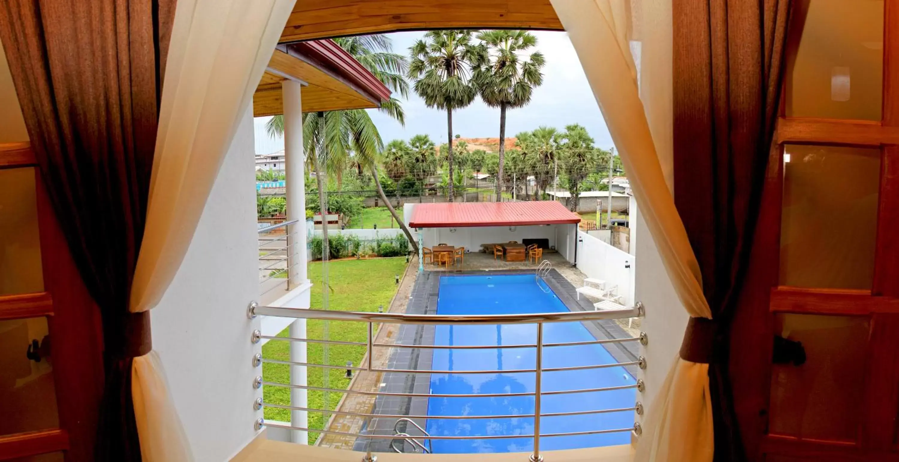 Deluxe Double Room with Pool View - 1st Floor in Bluewater Beach Resort Deluxe Double Room with Pool View - 1st Floor in Bluewater Beach Resort