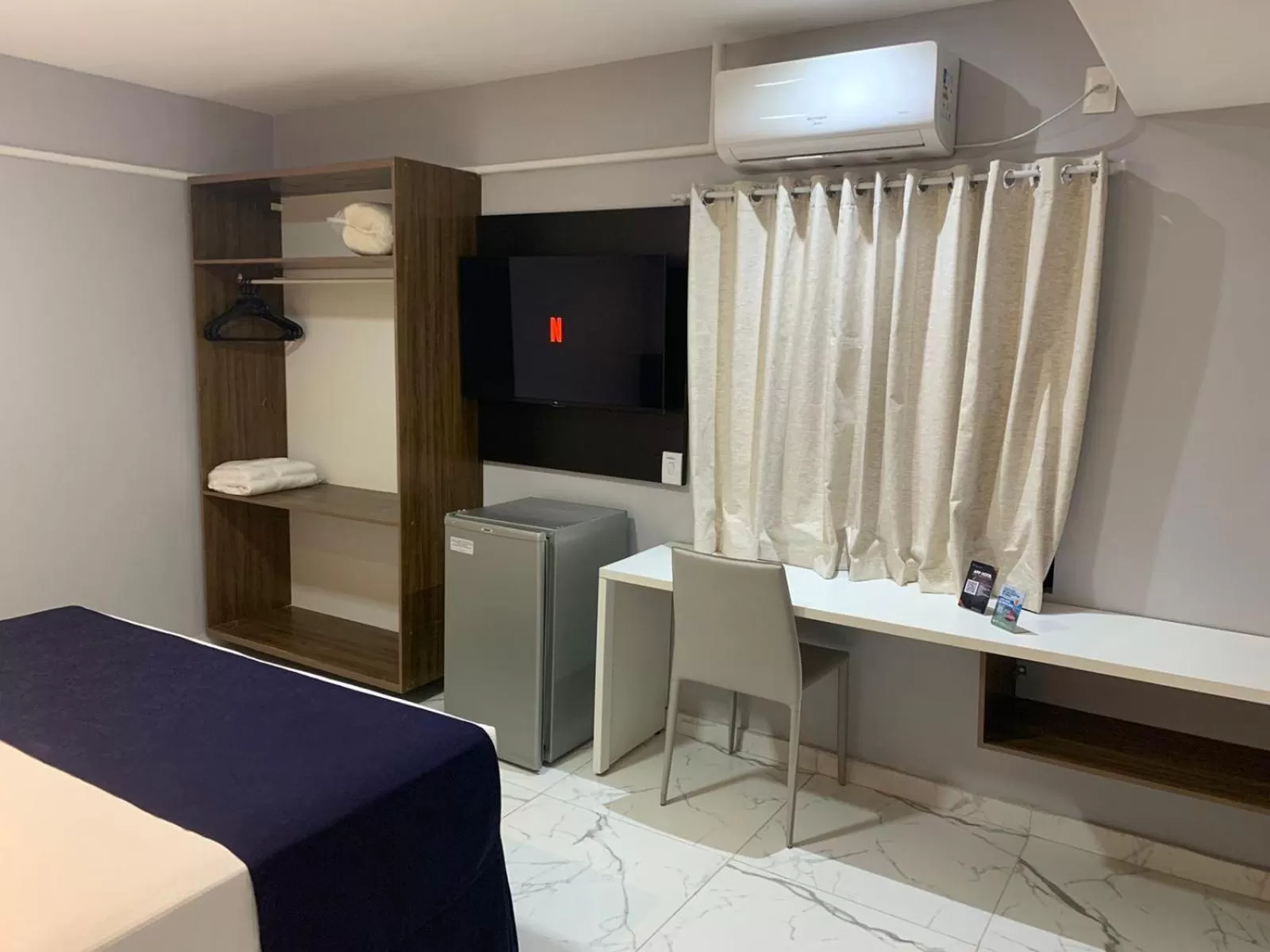 Bed in Netuanah Praia Hotel