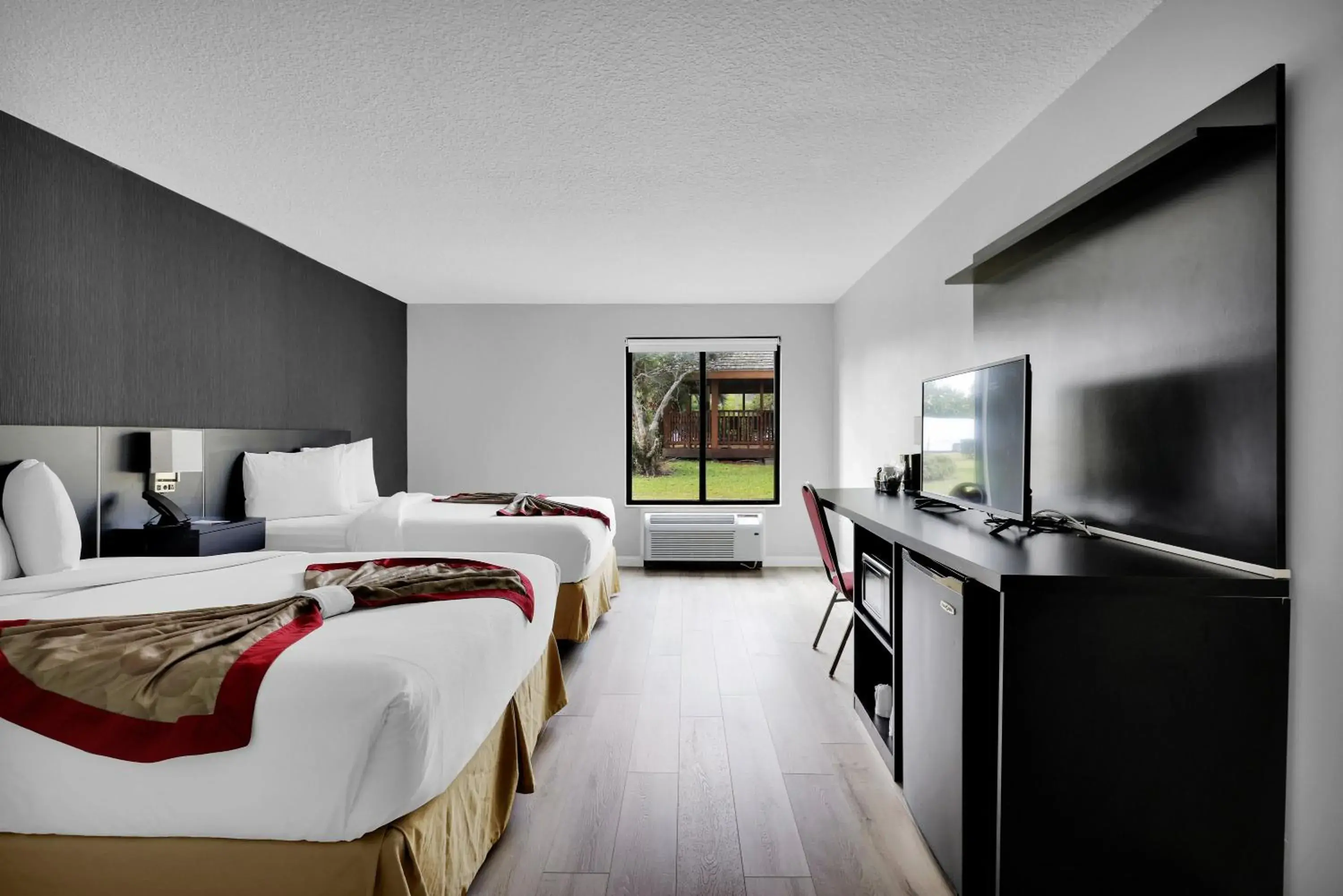 Deluxe Queen Room with Two Queen Beds - Mobility Access/Non-Smoking - Newly Renovated! in Ramada by Wyndham Jacksonville I-95 by Butler Blvd Deluxe Queen Room with Two Queen Beds - Mobility Access/Non-Smoking - Newly Renovated! in Ramada by Wyndham Jacksonville I-95 by Butler Blvd