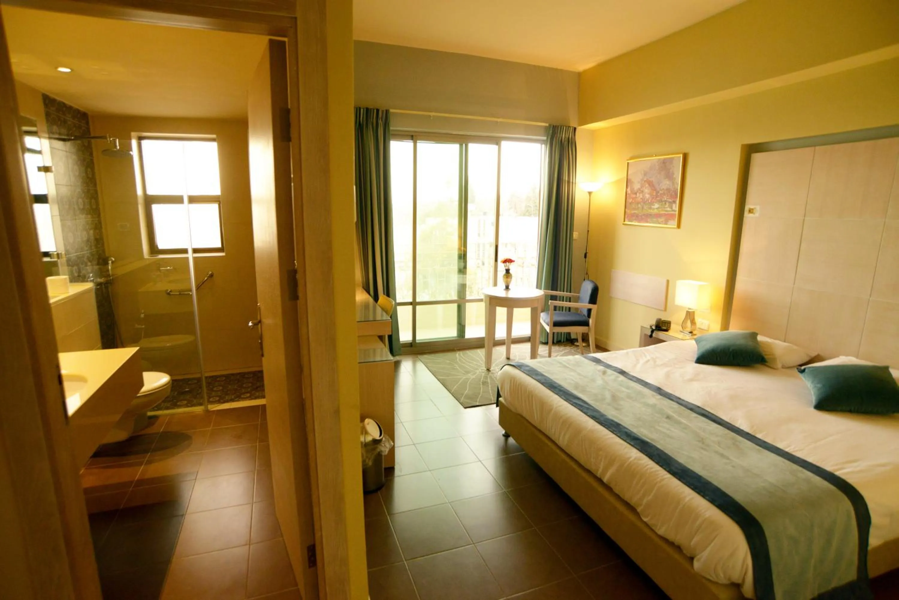 Photo of the whole room, Bed in Holy Land Hotel