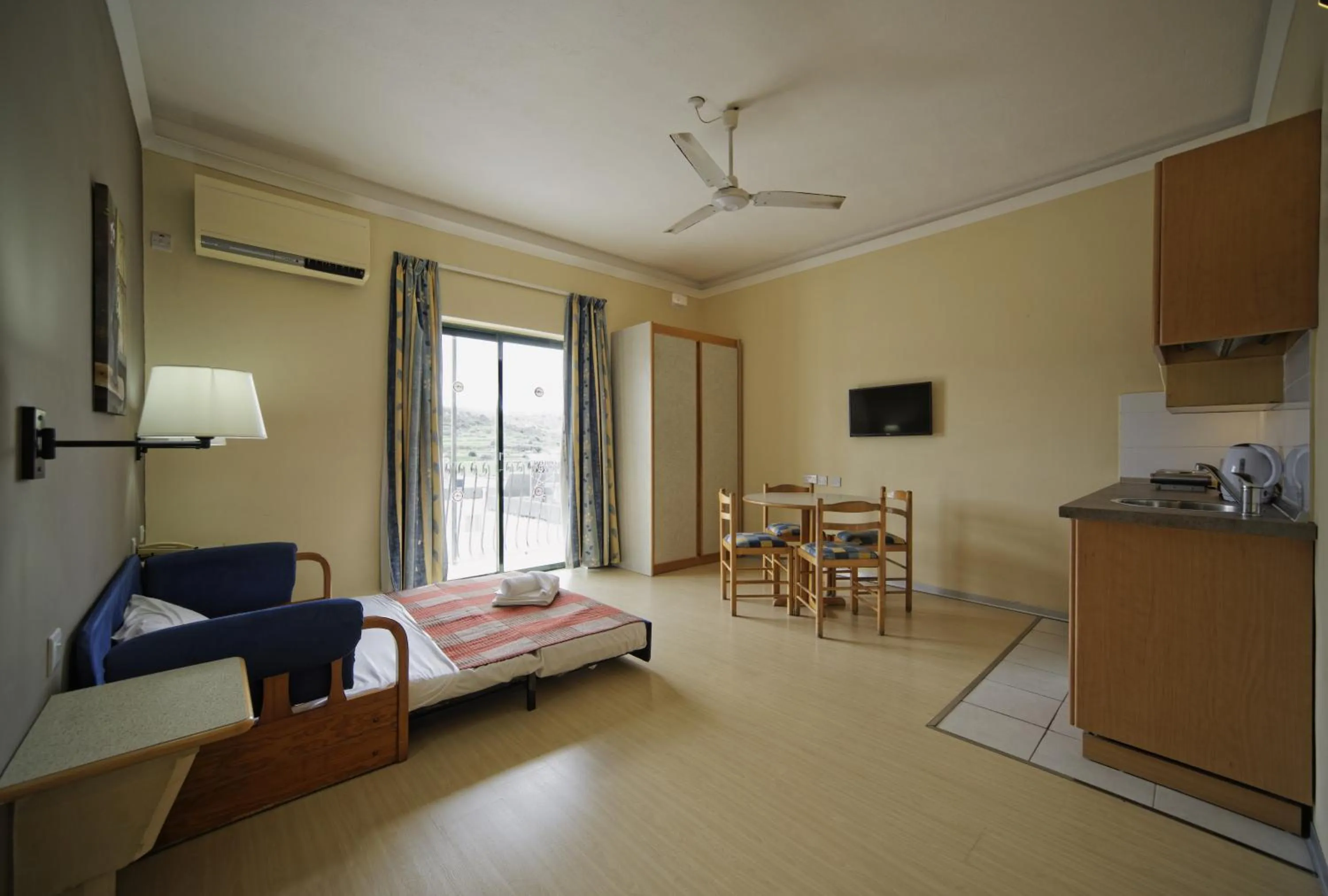 Photo of the whole room, Bed in Porto Azzurro Aparthotel