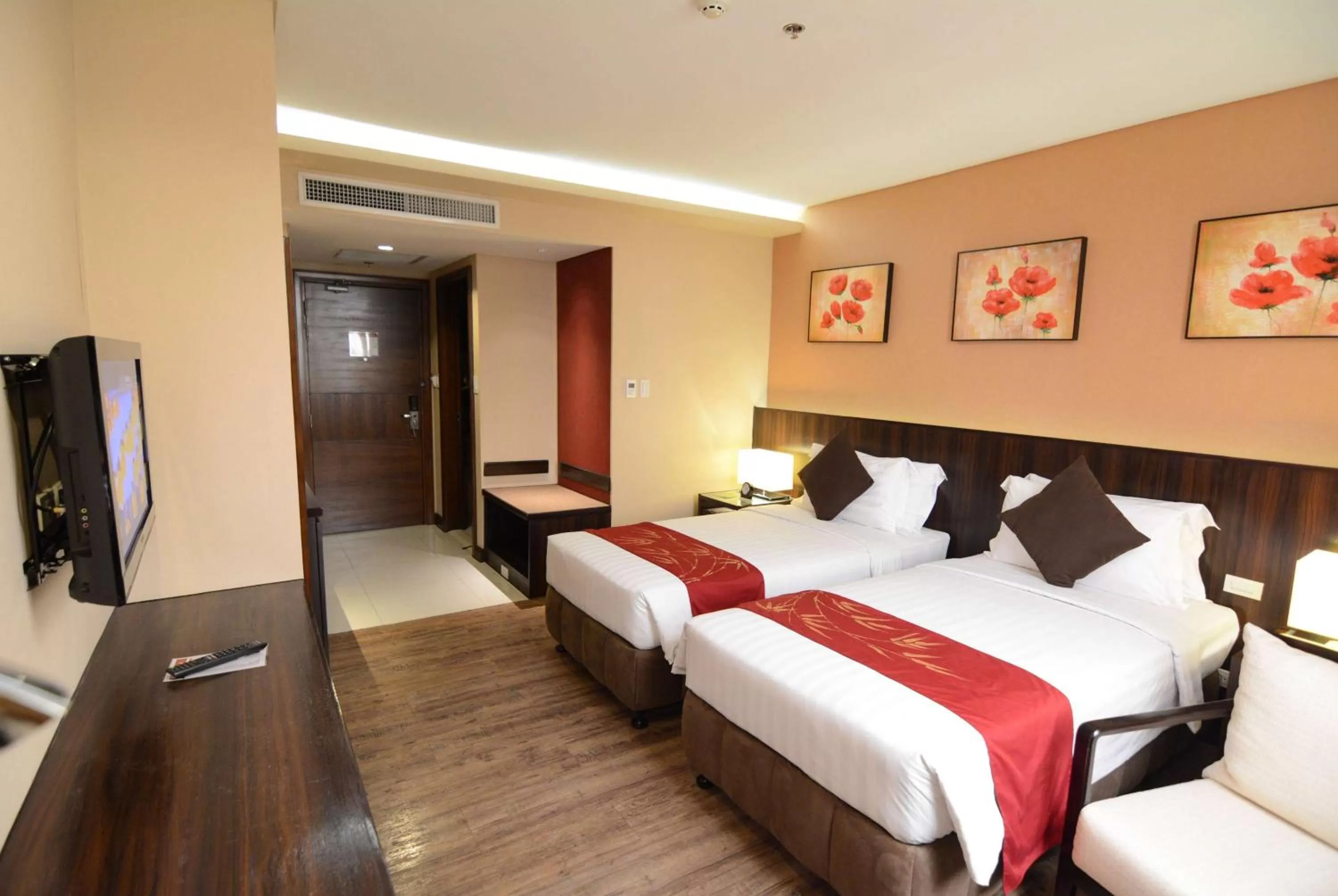 Photo of the whole room, Bed in Ramada by Wyndham Manila Central