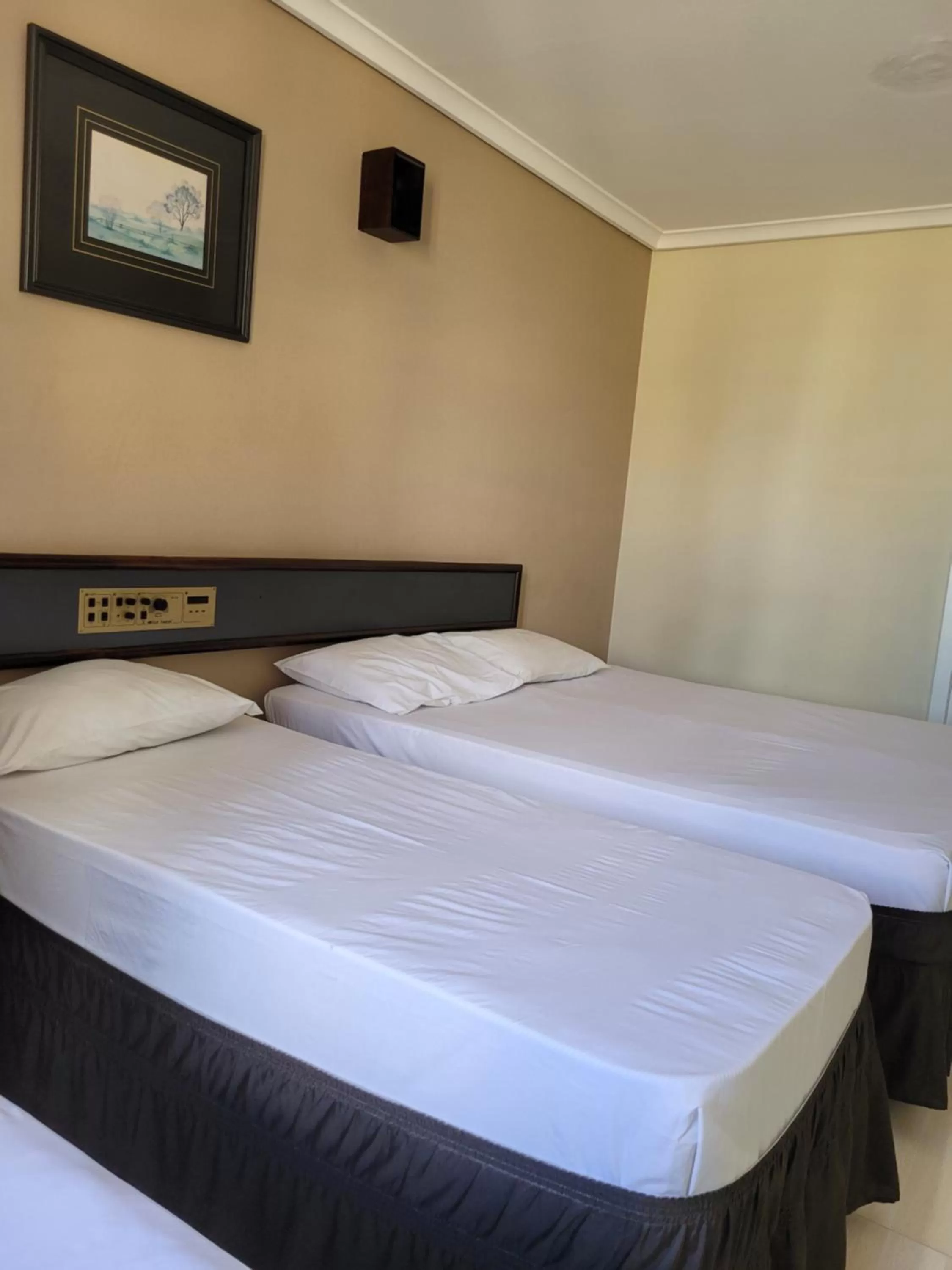 Bed in Hotel Estação Express