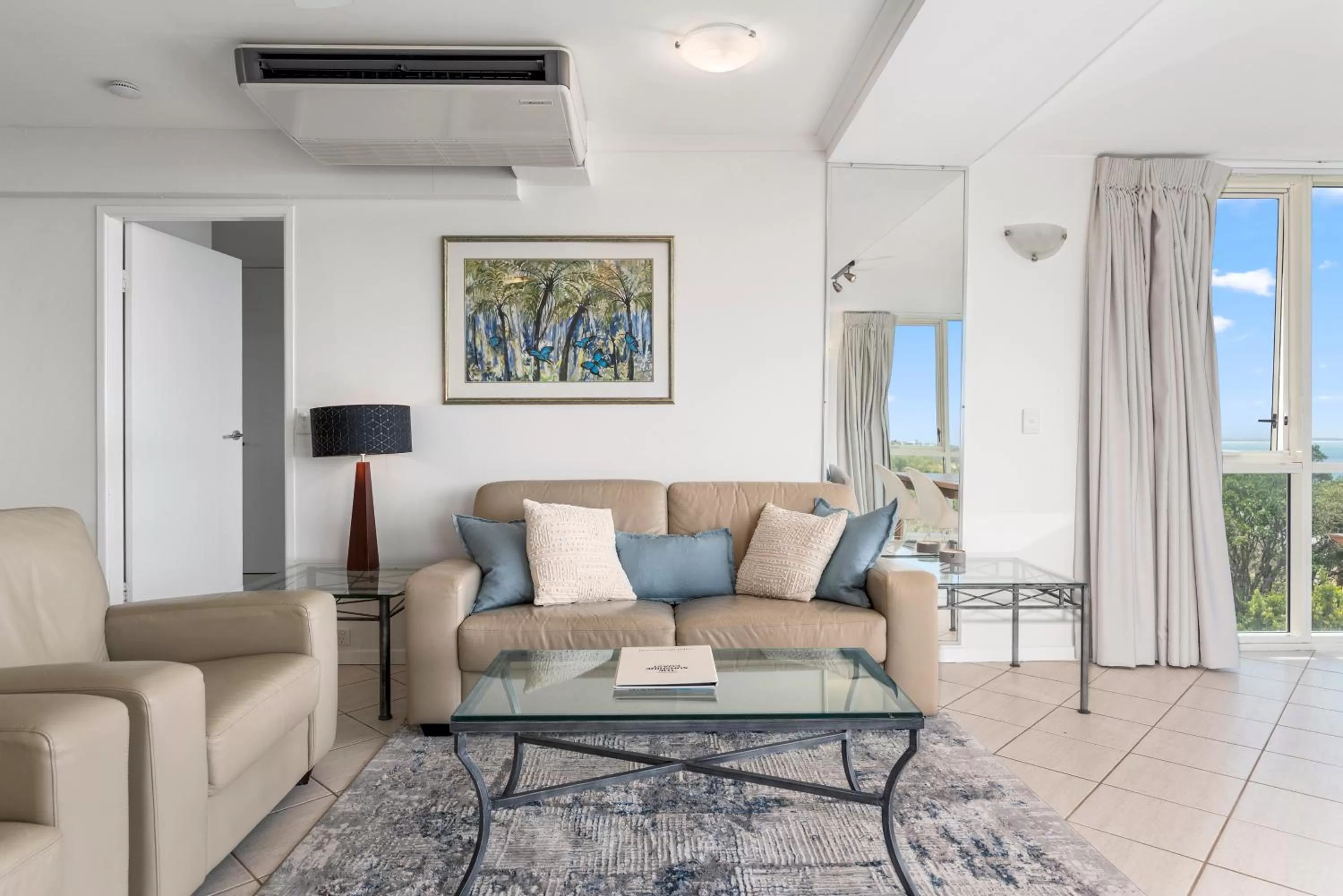 Living room in 84 The Spit Holiday Apartments