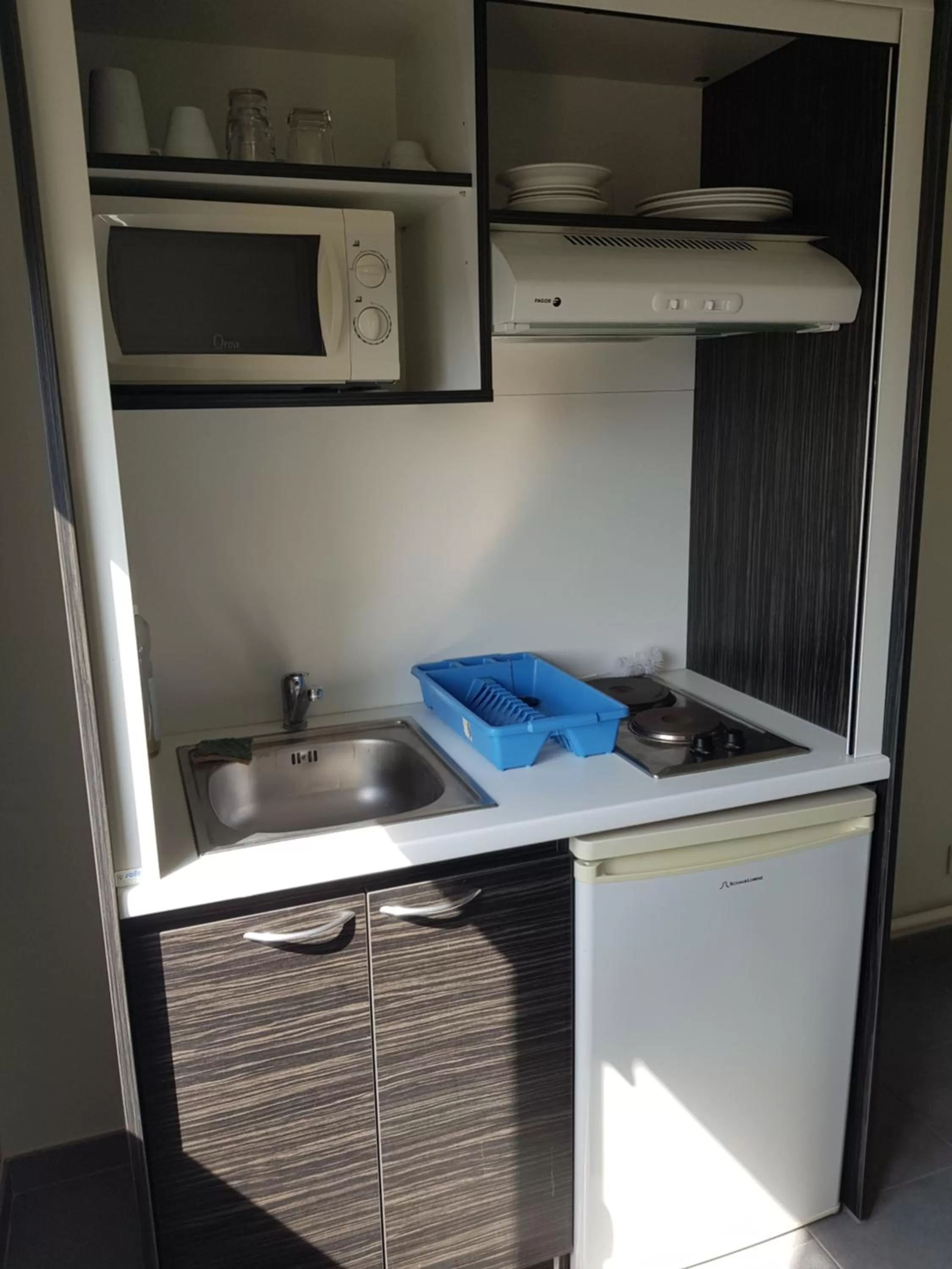 Kitchen or kitchenette in Kyriad Hotel Tours Centre