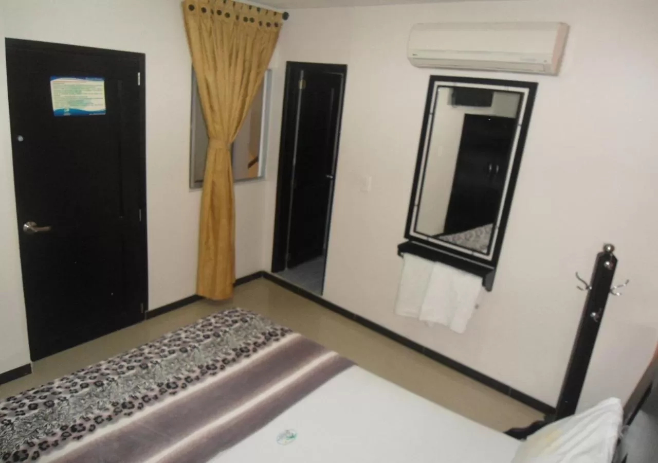 TV/Entertainment Center in Hotel Palmeras De Mariana