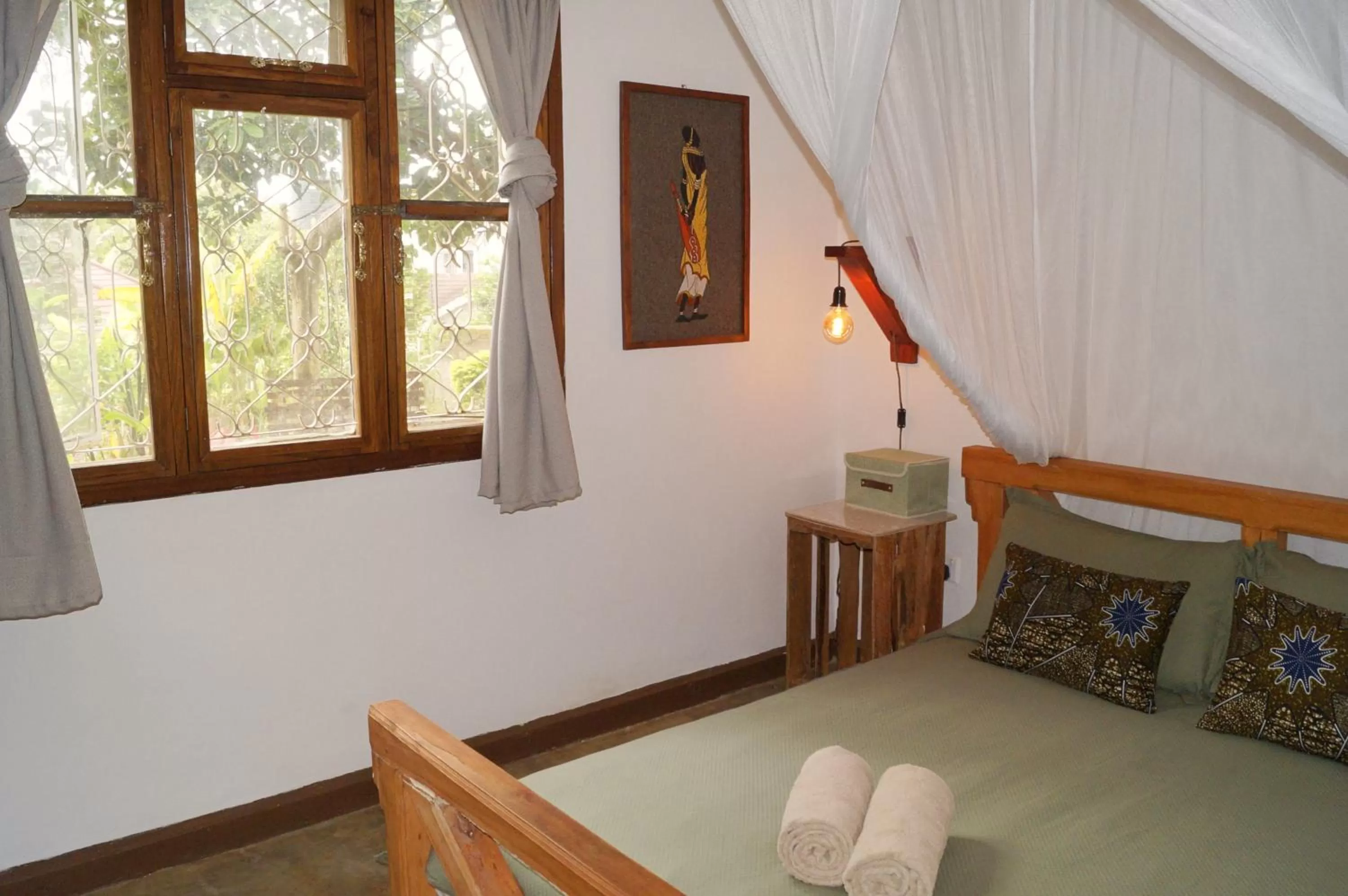 Bed in Utamaduni House B&B