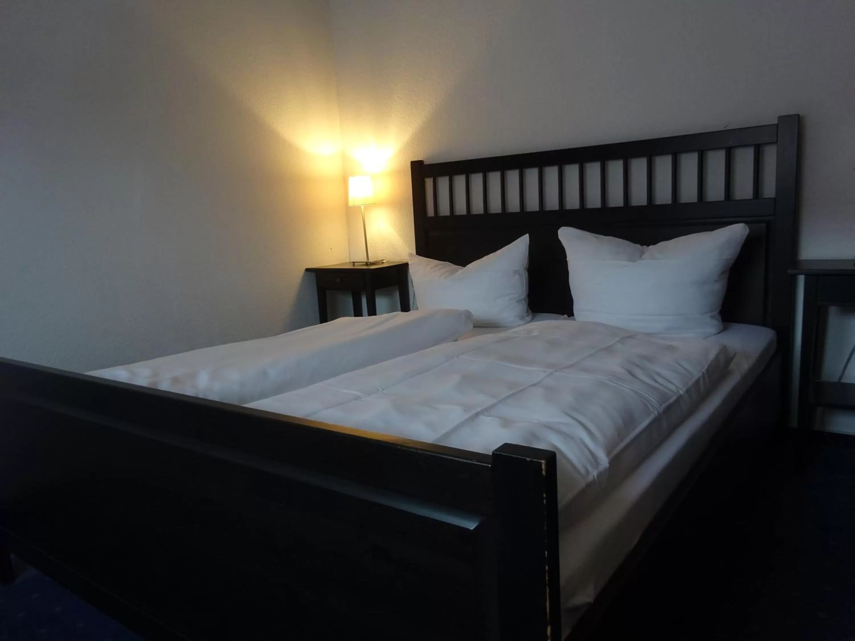 Bed in Gästehaus Weingärtner