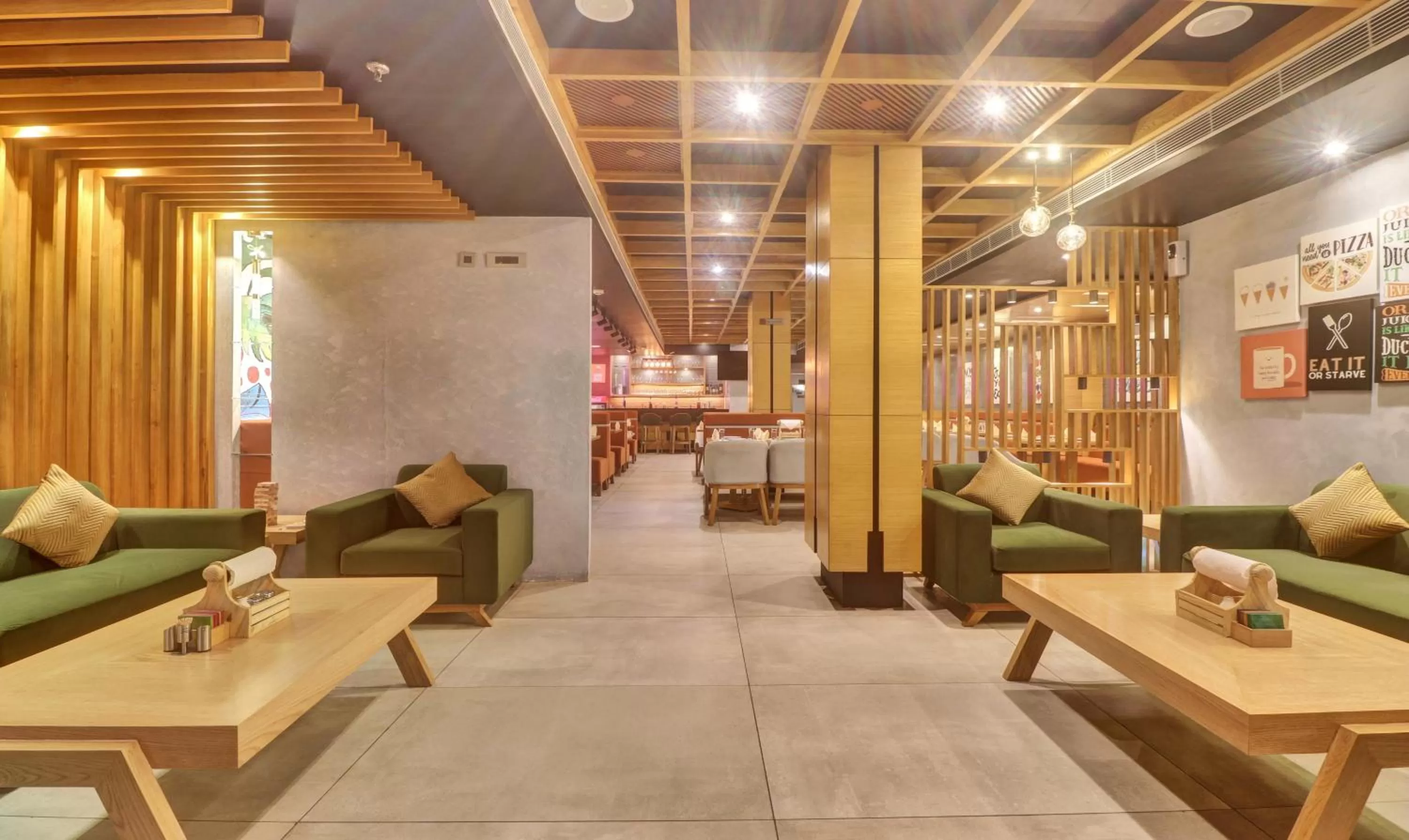 Seating area, Restaurant/Places to Eat in Treebo Tryst Tamarind