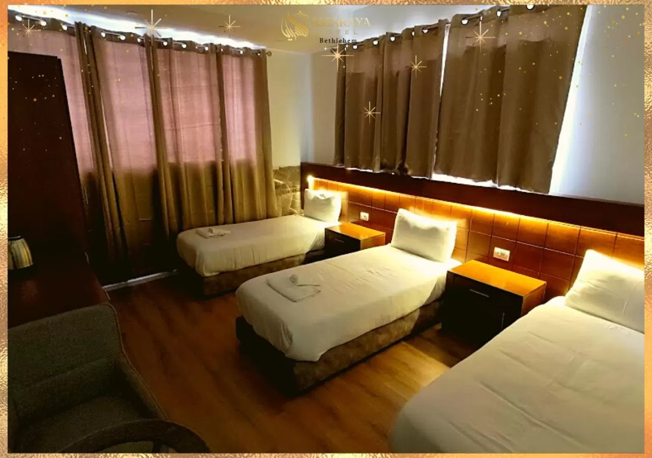 Bed in Assaraya Palace Hotel