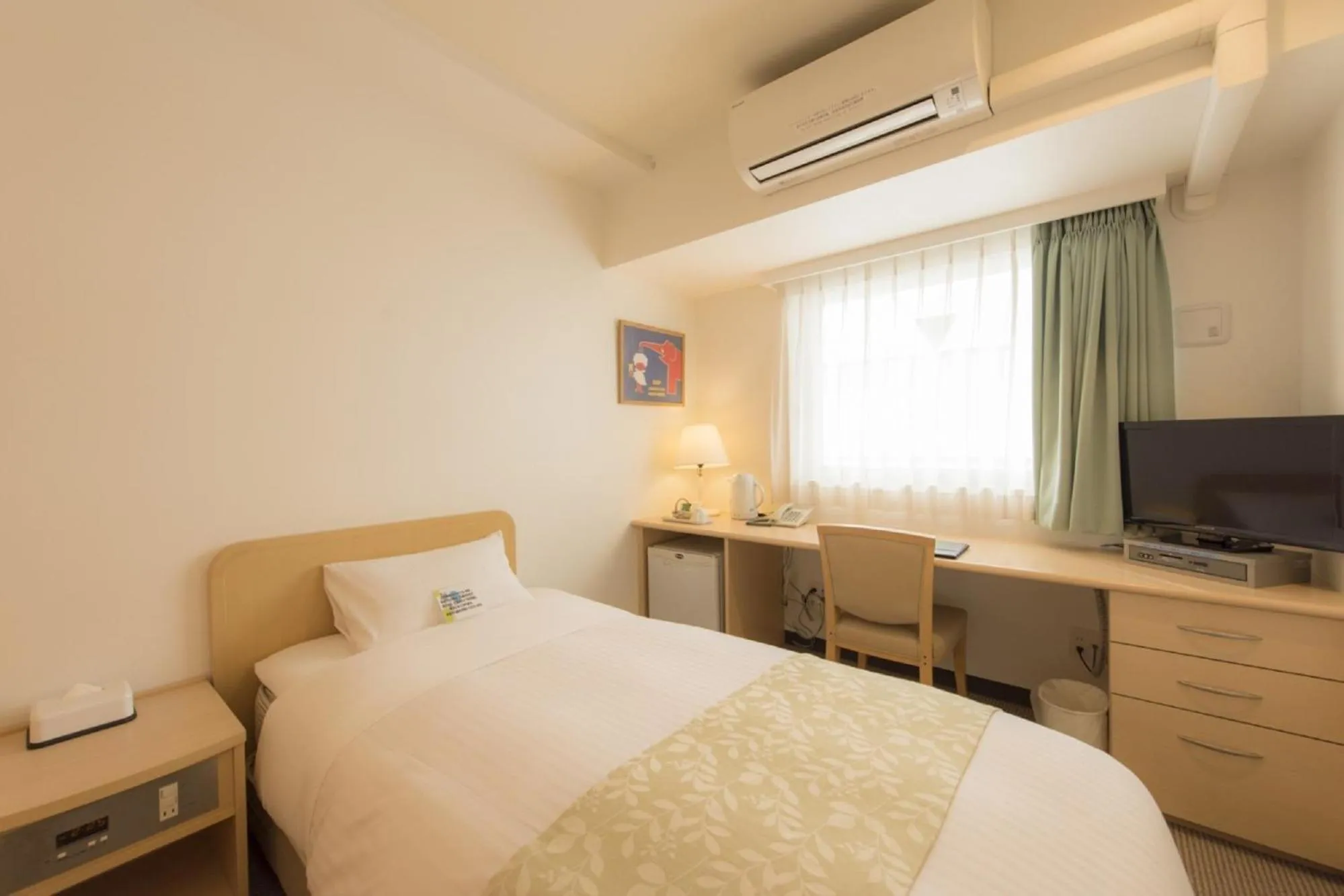 Photo of the whole room, Bed in Hotel Famy Inn Kinshicho