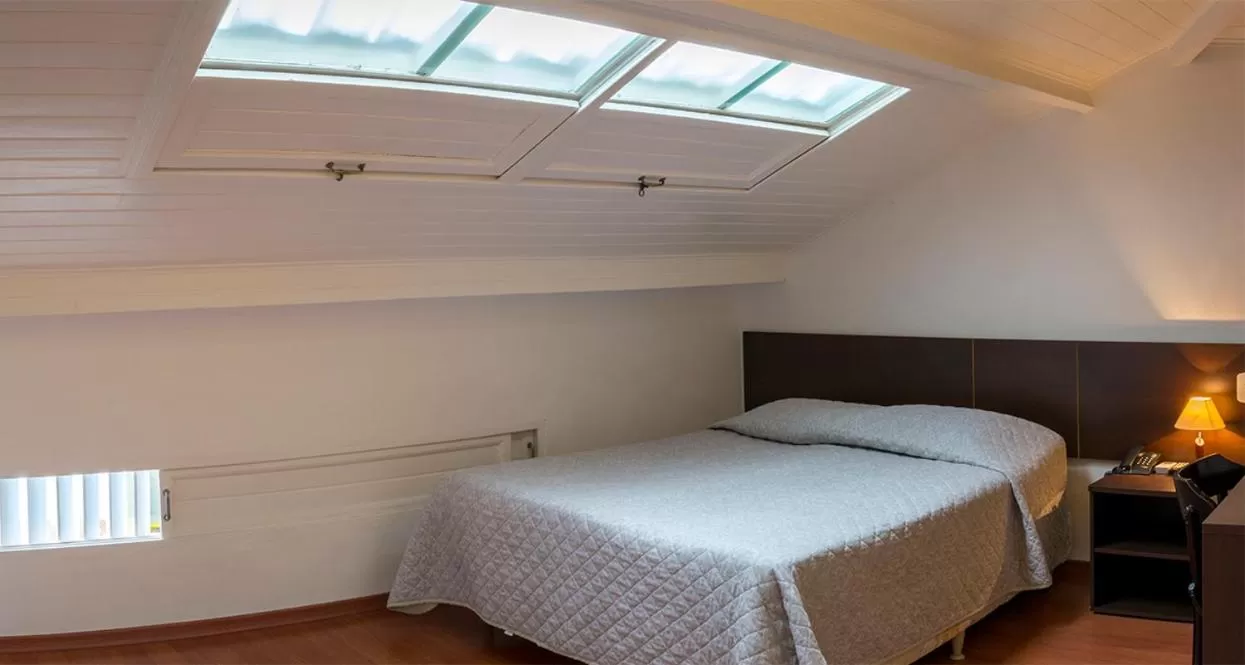 Bed in Pousada Dos Ofícios