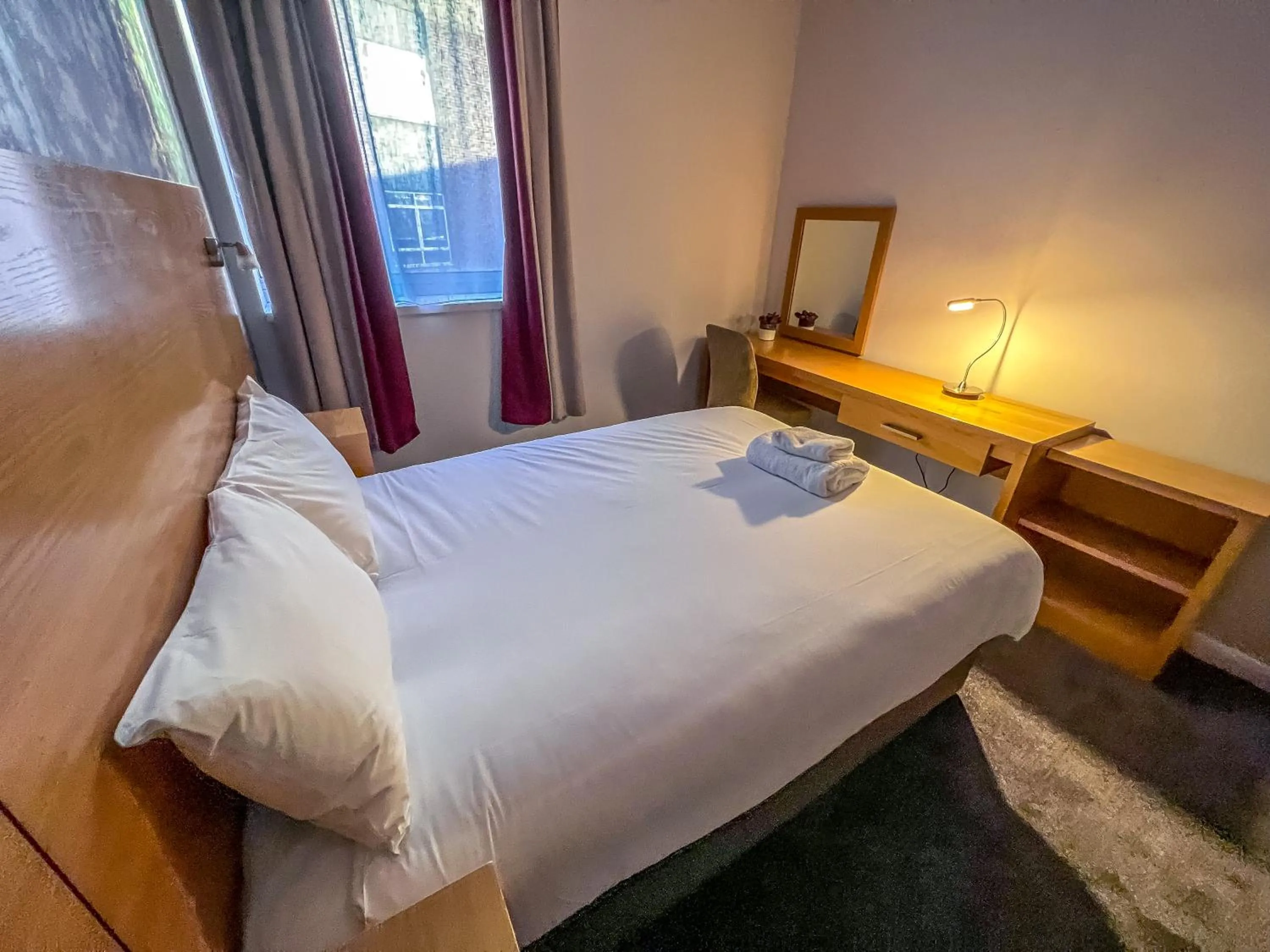 Bedroom in County Hall Apartment Hotel