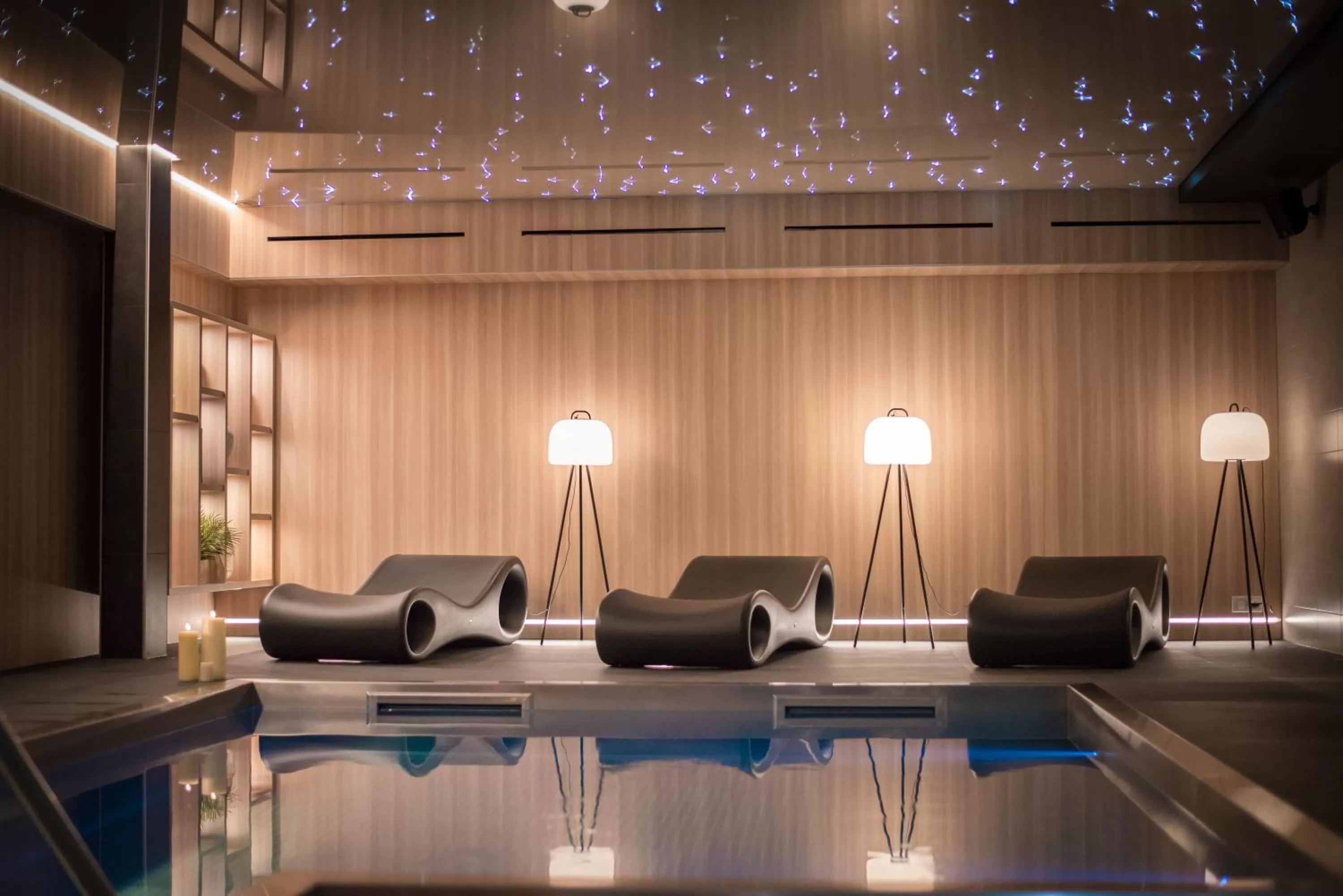 Swimming pool in L' Hôtel & Spa Ribeauville- Haut-Koenigsbourg