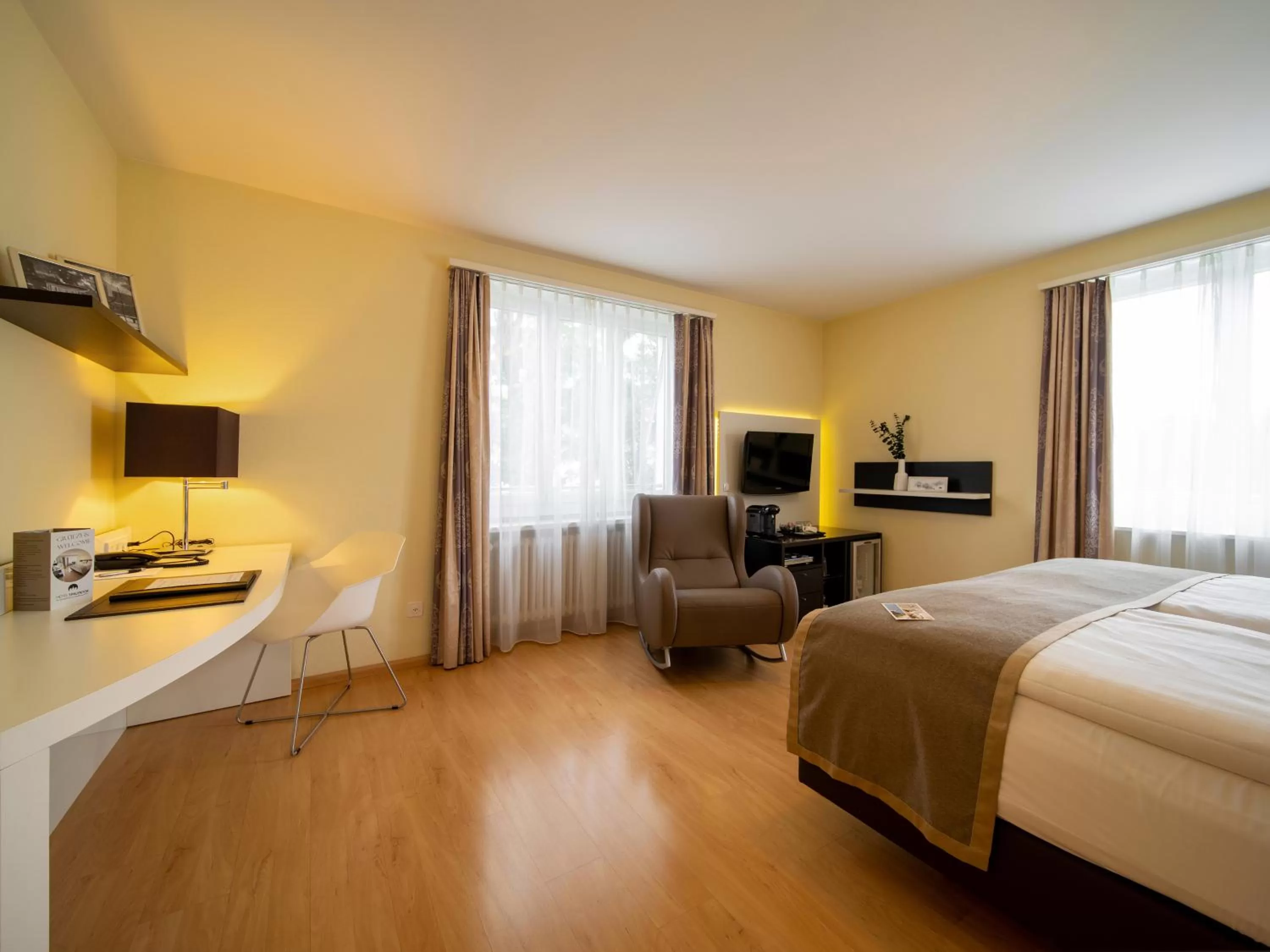 Bed in Hotel Spalentor - Ihr sympathisches Stadthotel