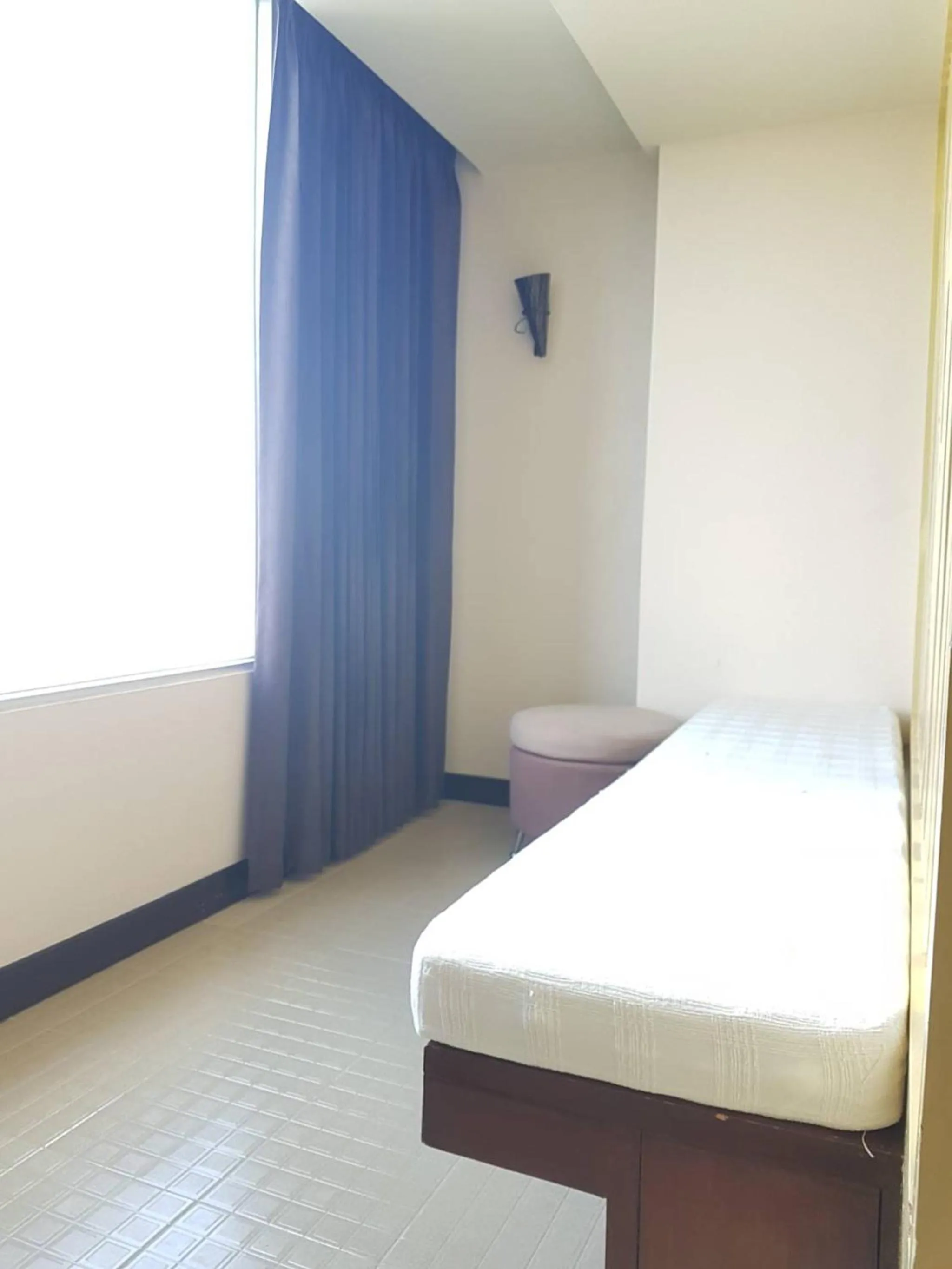 Bed in Maninarakorn Hotel