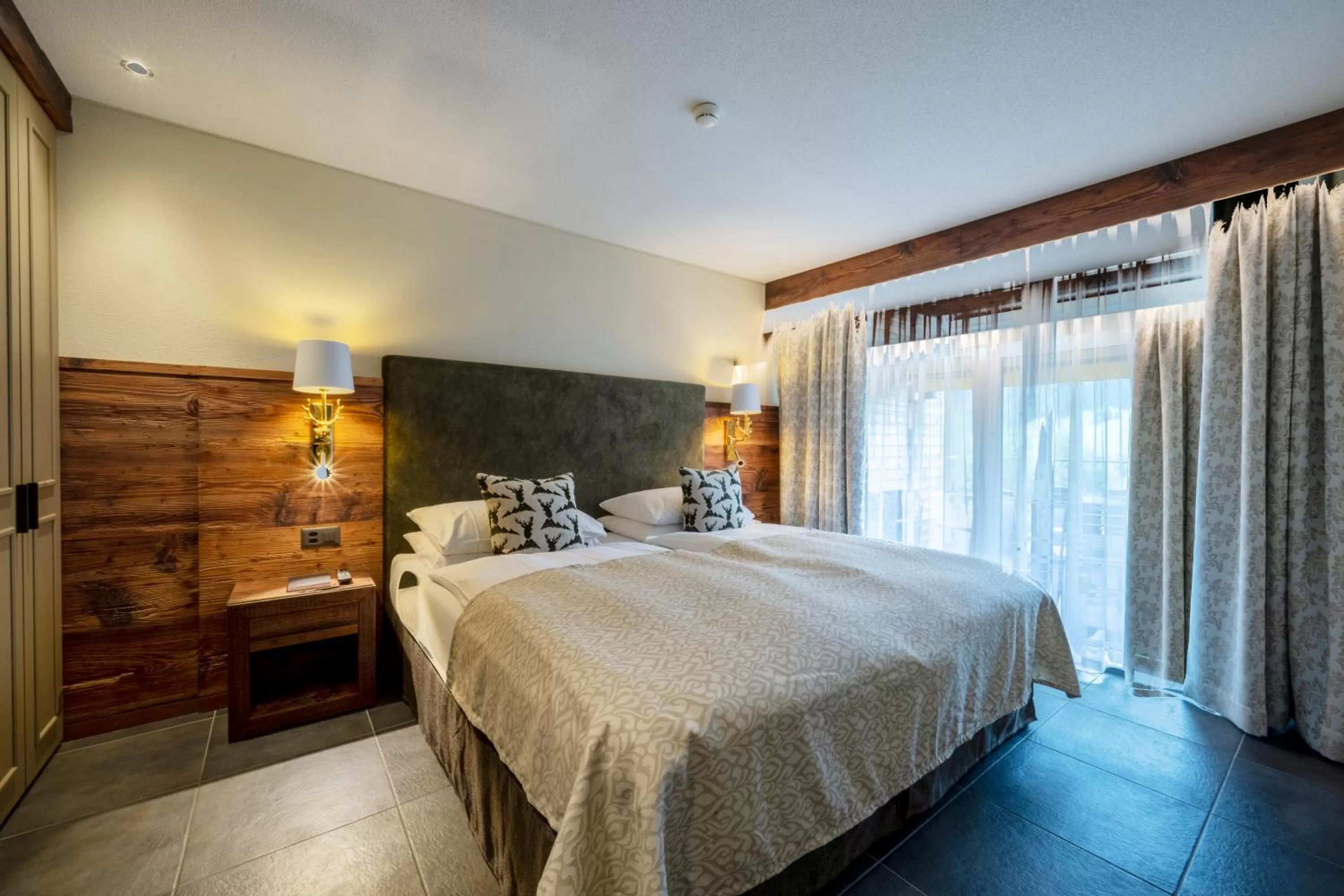 Bedroom, Bed in Romantik Hotel Schweizerhof