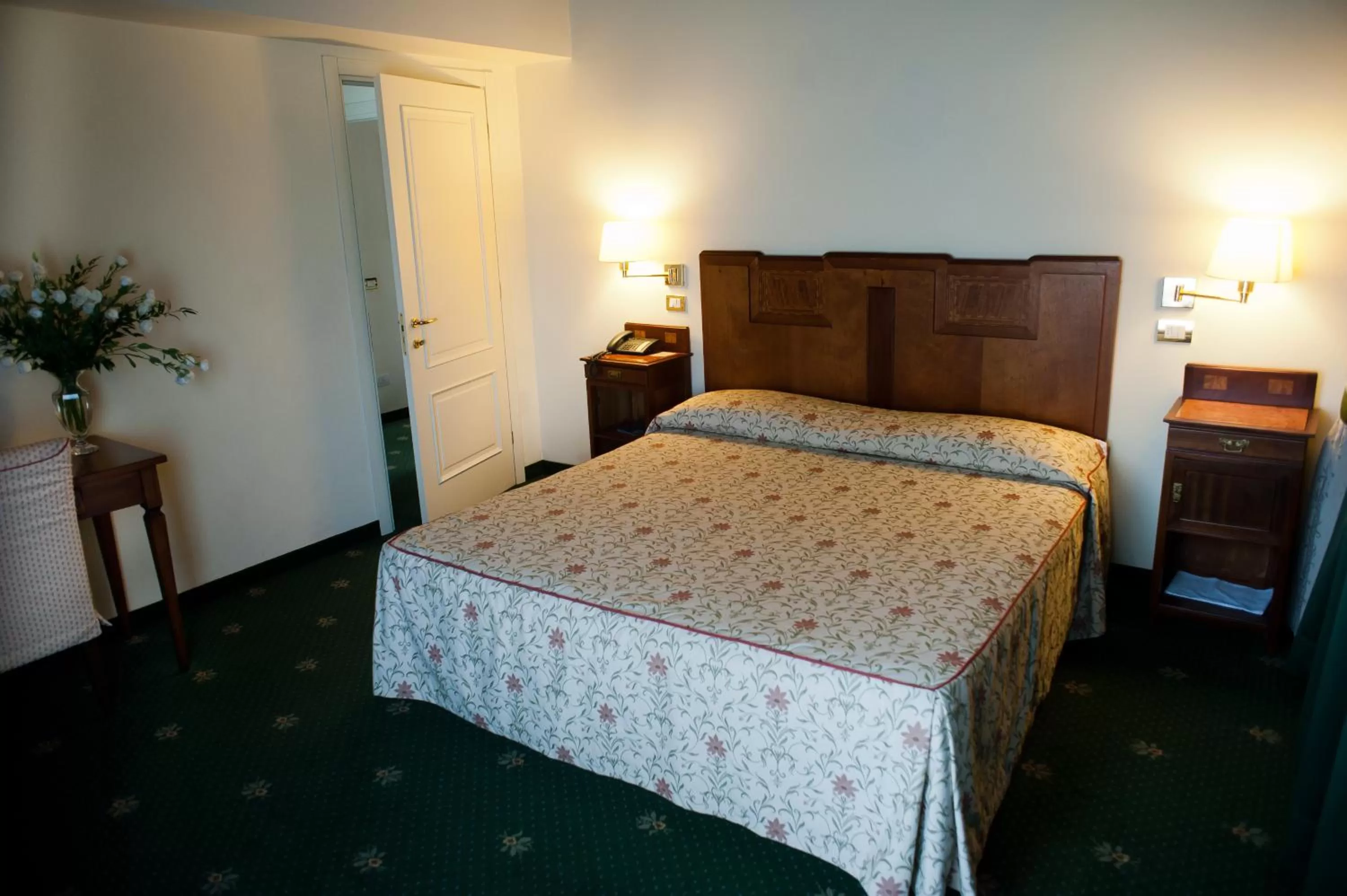 Bed in Hotel Candiani