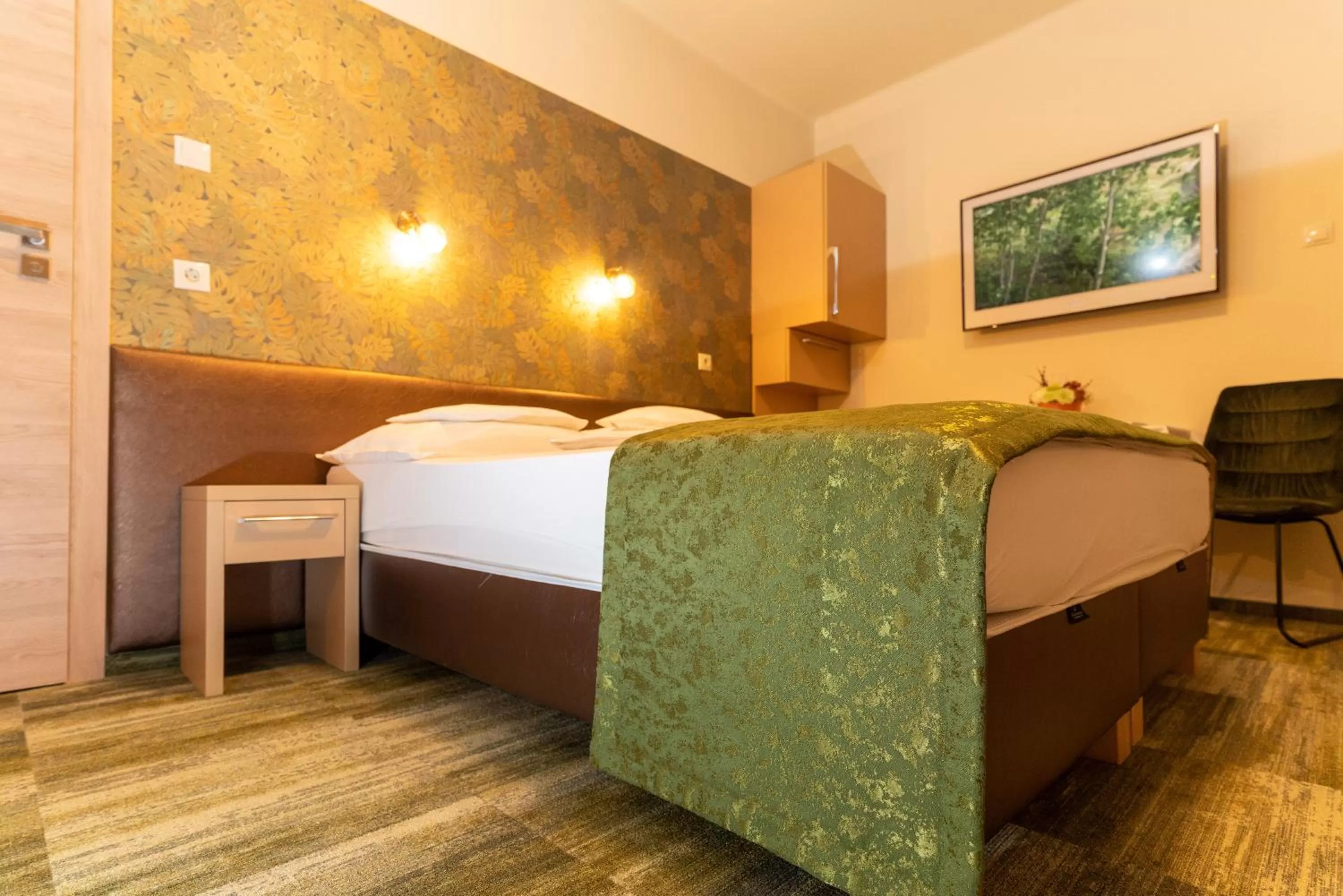 Bed in Teátrum Boutique Hotel