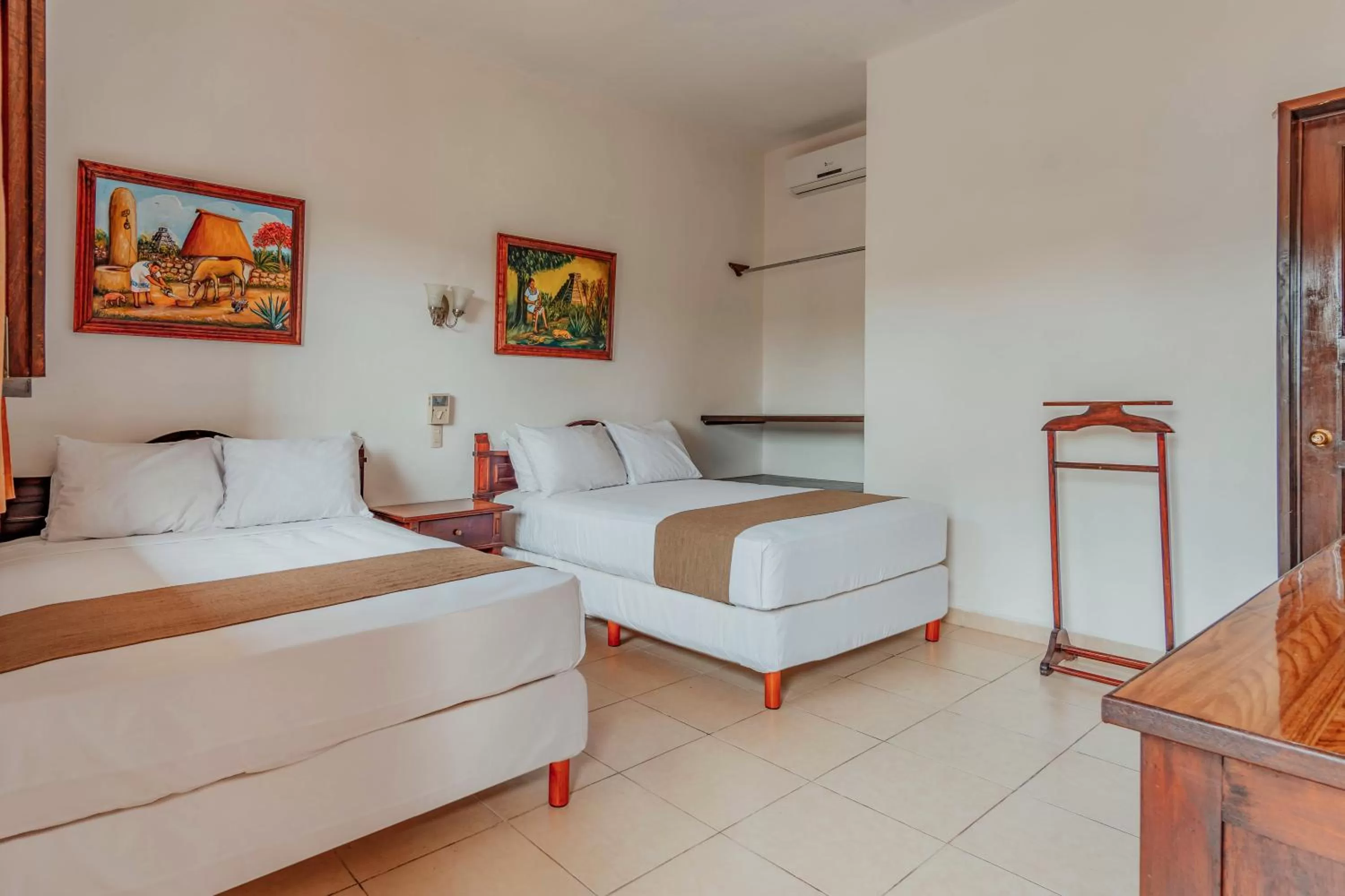 Bed in Hotel Santa María Mérida