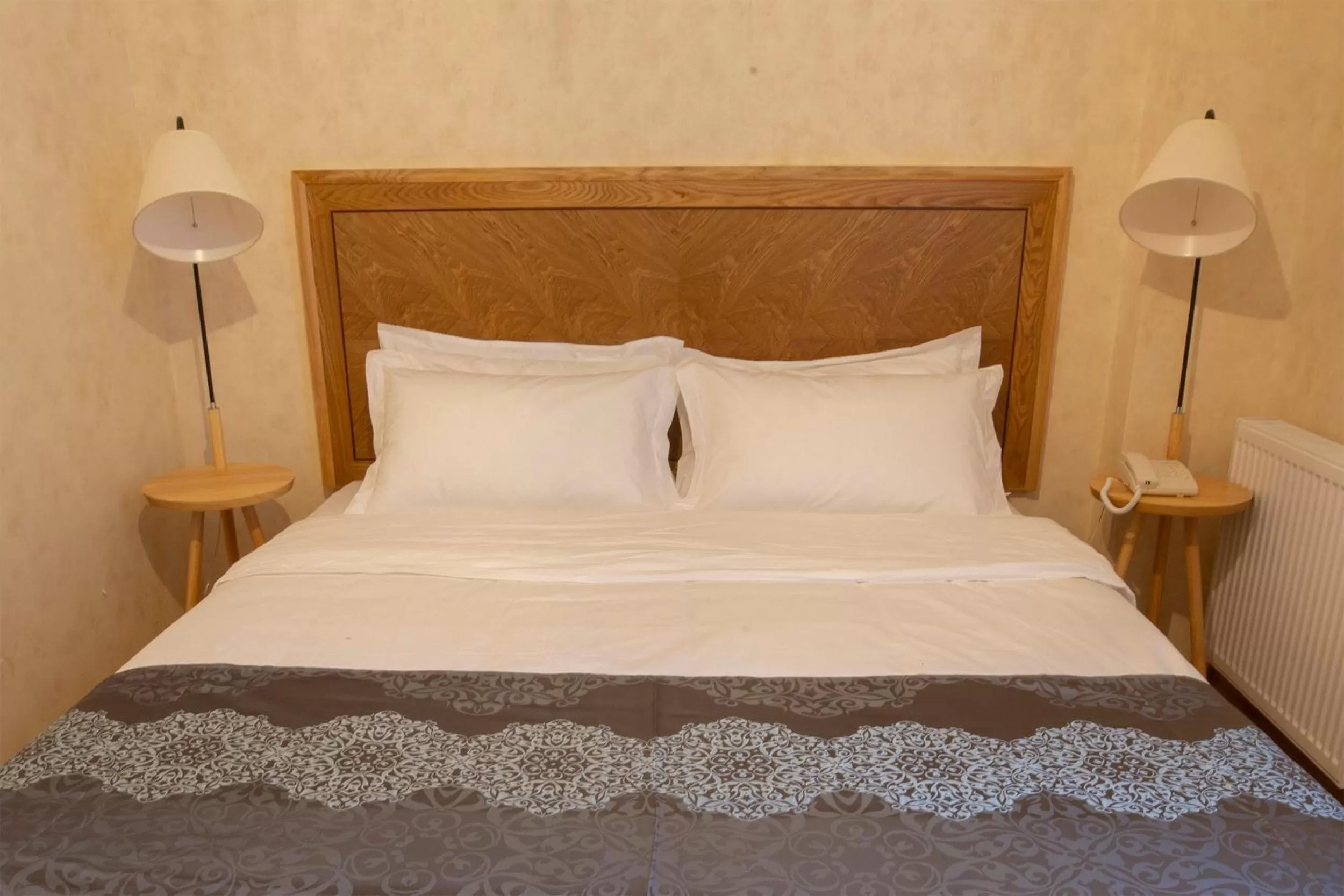 Bed in Ornament Boutique Hotel