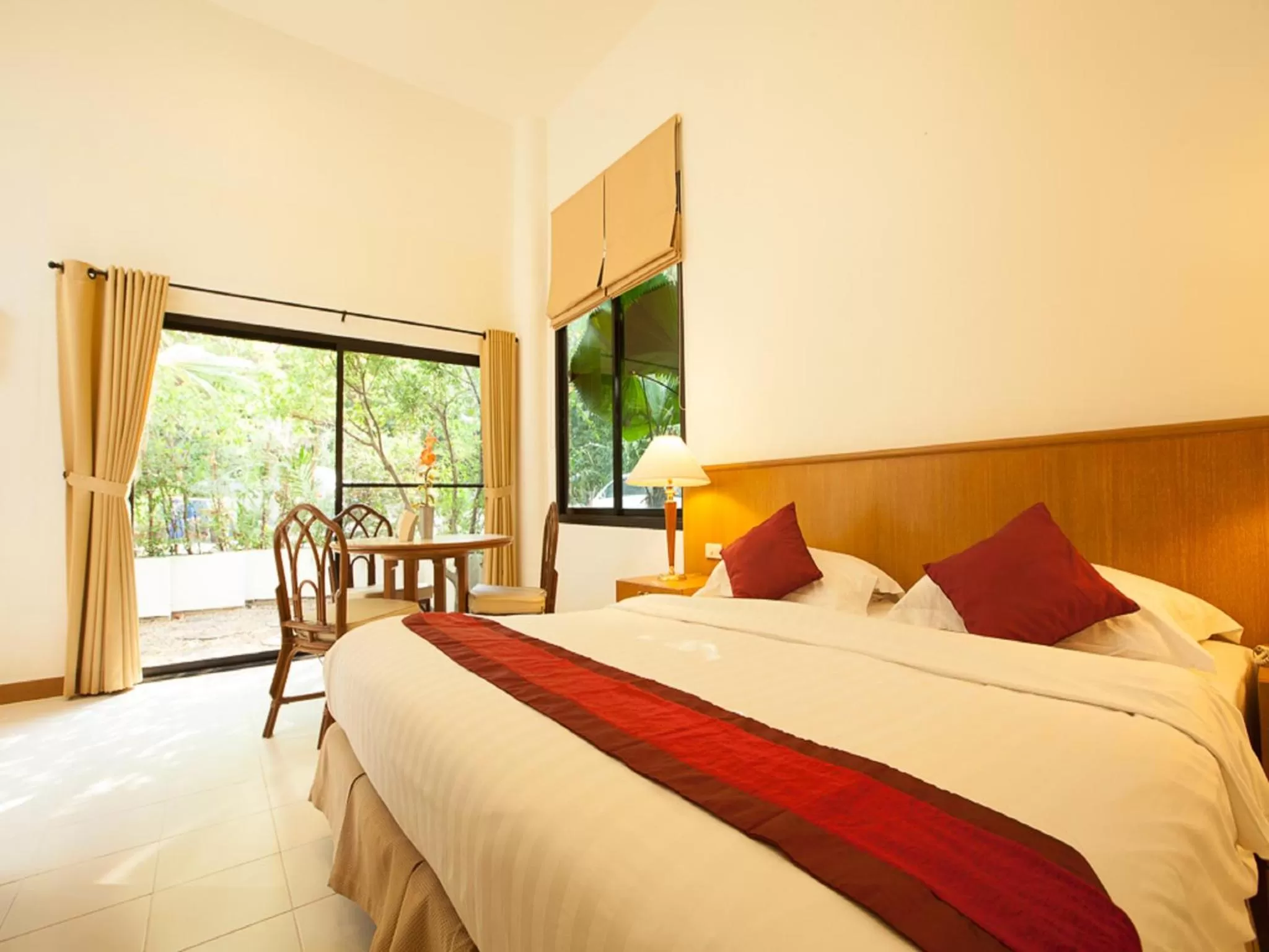 Seating area, Bed in Nern Chalet Beachfront Hotel