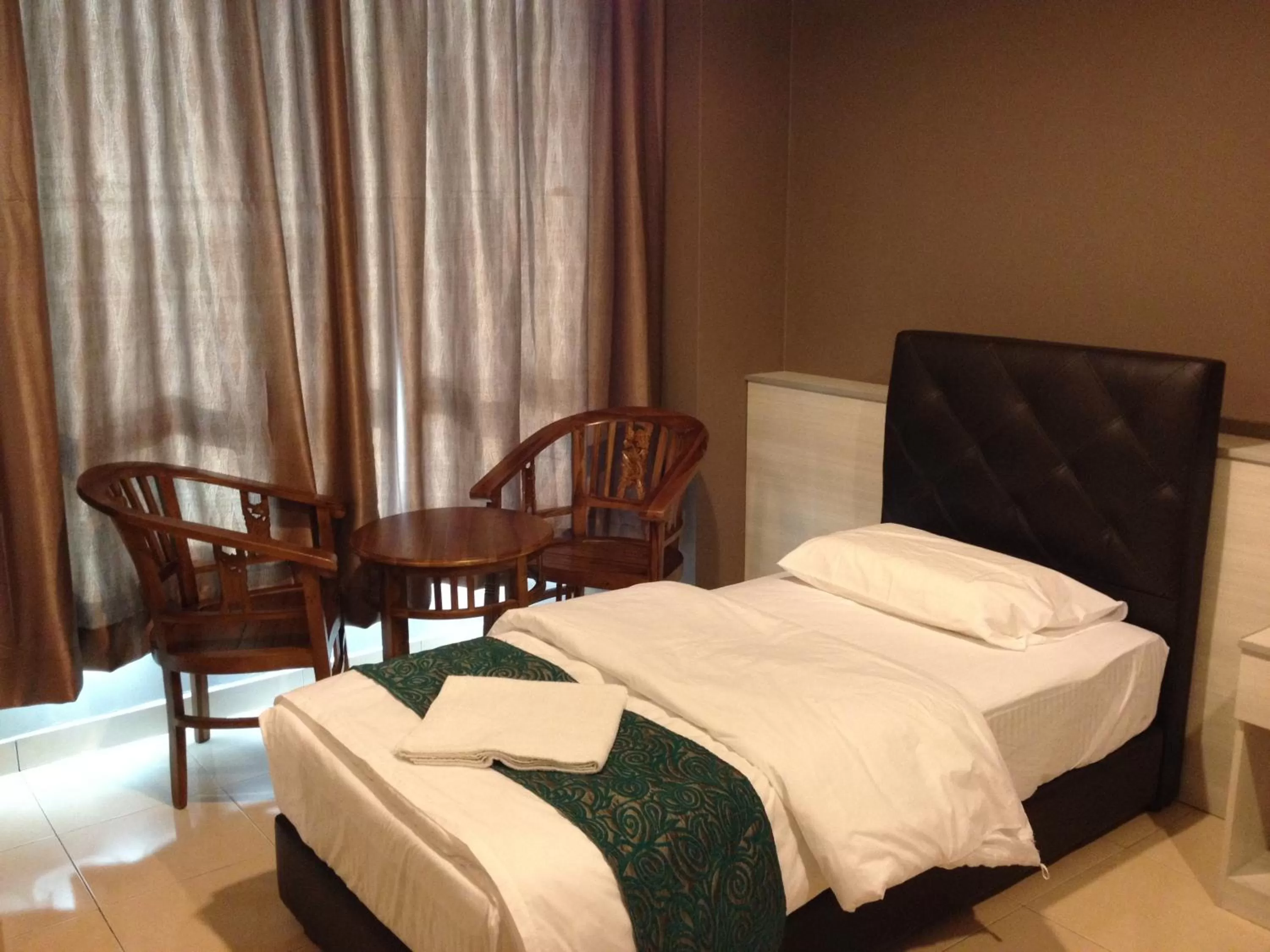 Bed in AERO Star Hotel