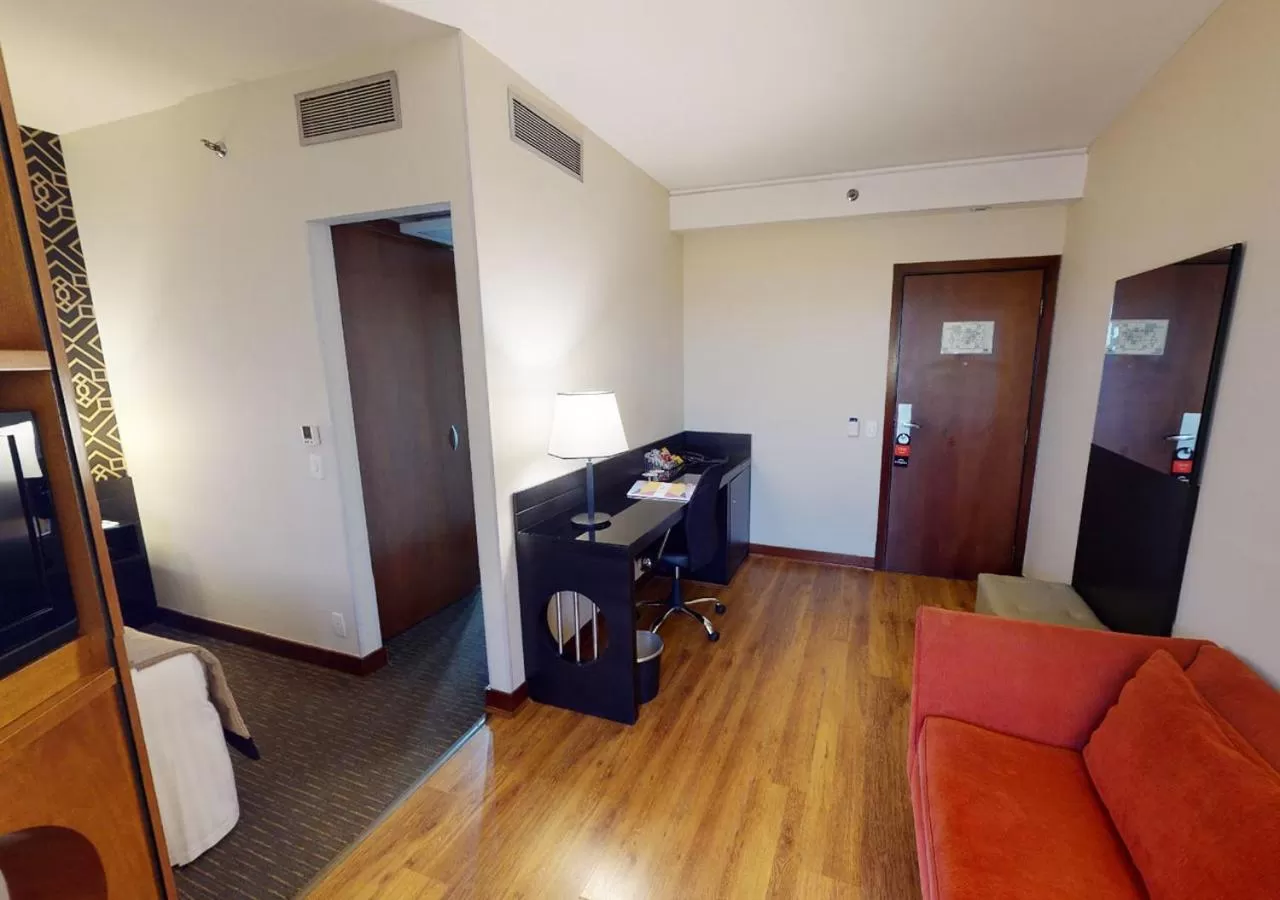 Communal lounge/ TV room in Estanplaza Funchal Faria Lima