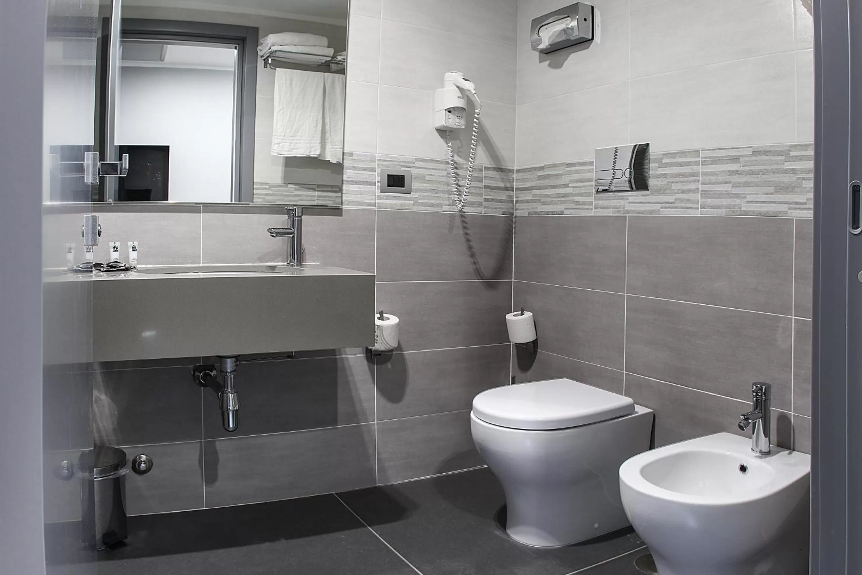 Toilet in Best Western JFK Hotel