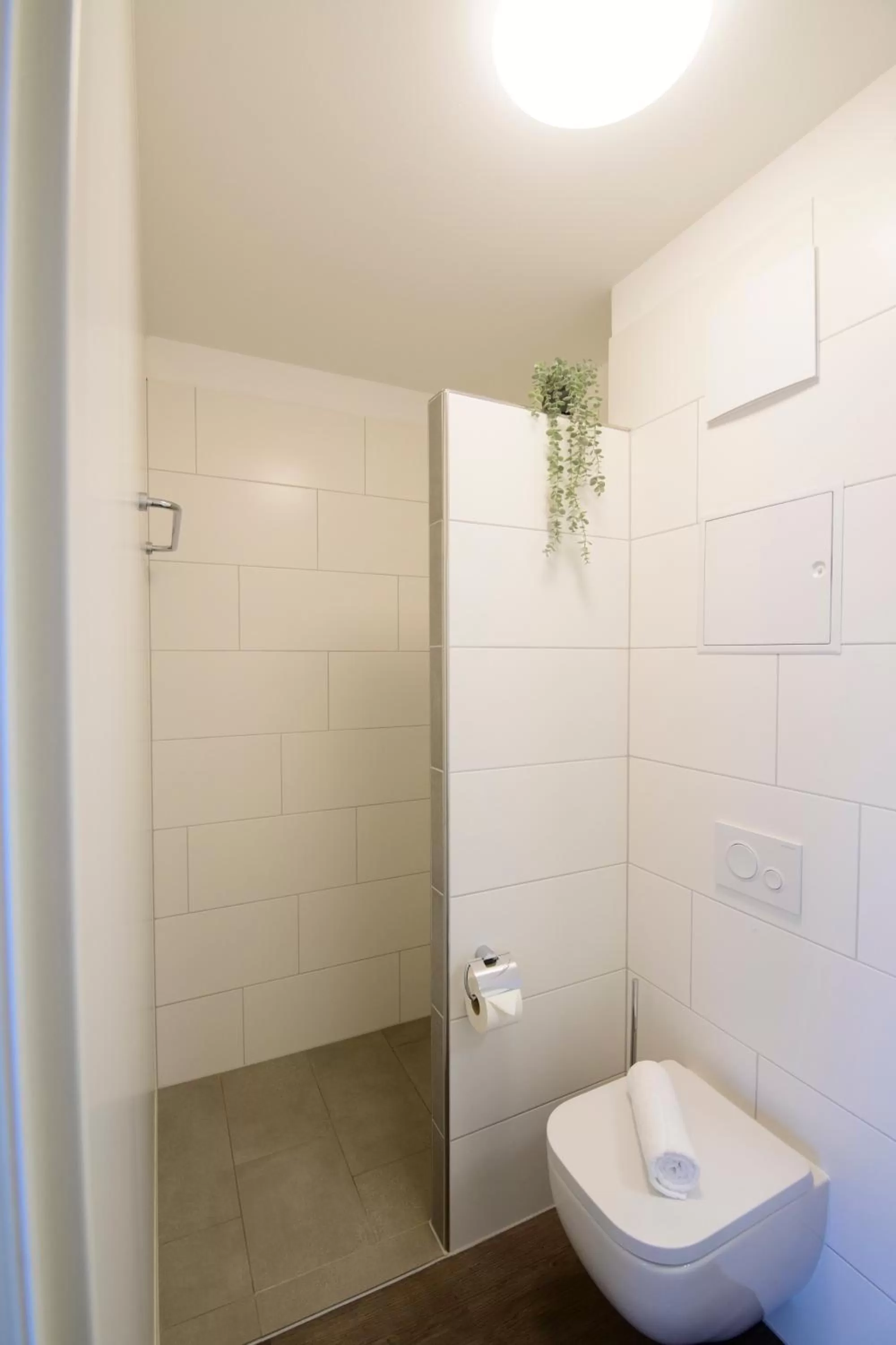 Bathroom in Smart & Stay Aparthotel Saarbrücken Süd - Self-Check-In - Free Parking