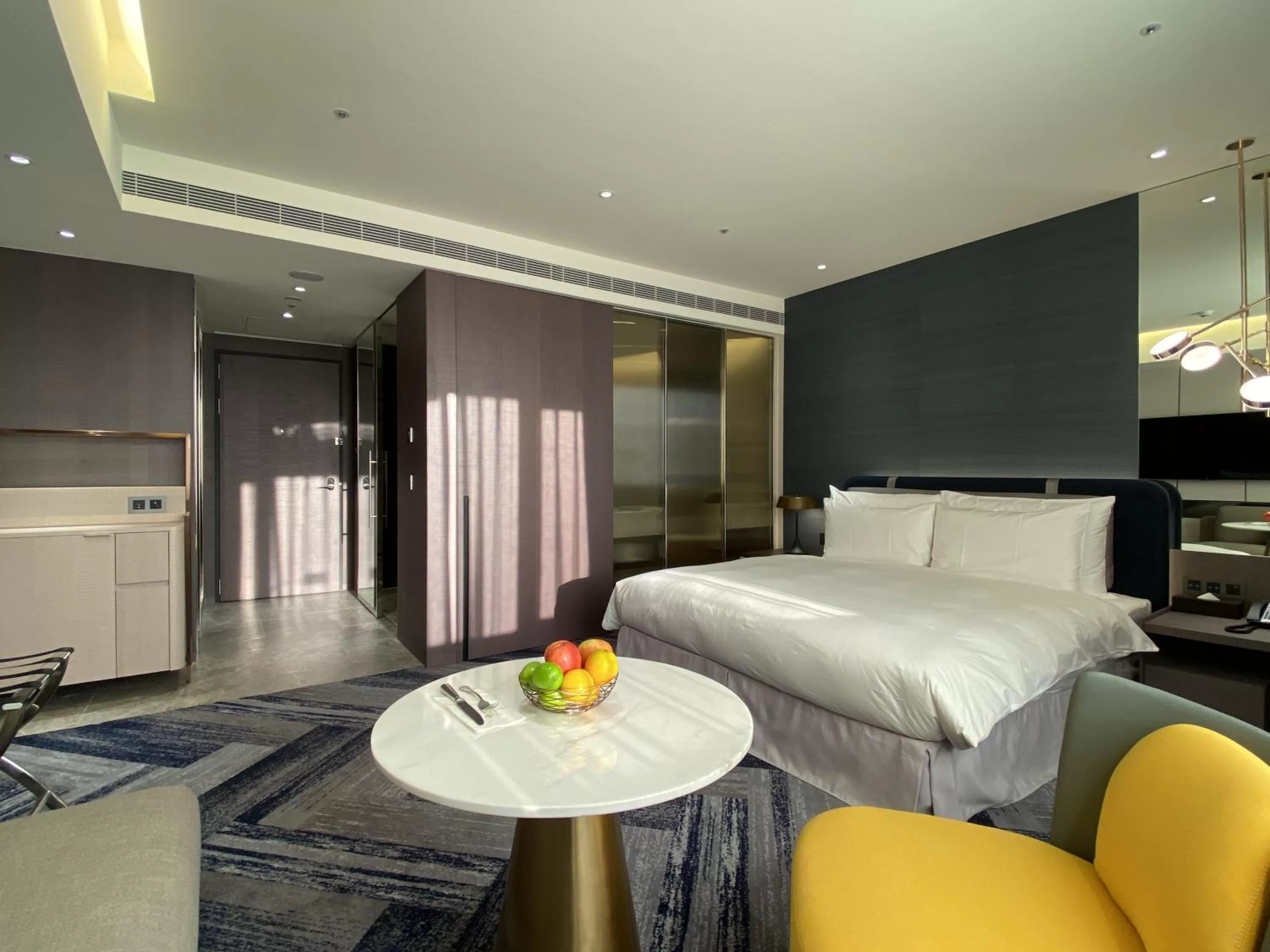 Bed in Monarch Plaza Hotel