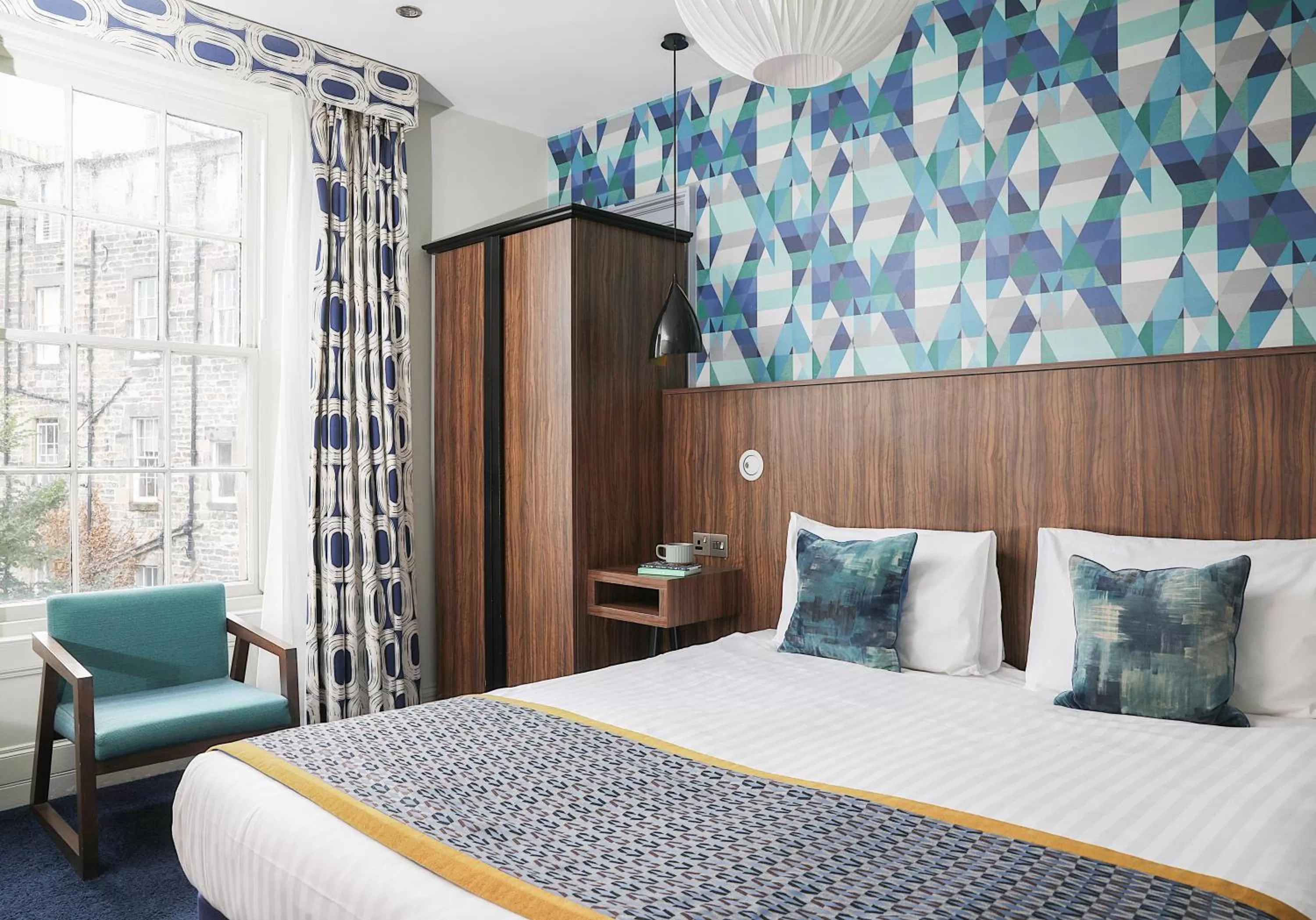 Bed in Cairn Hotel & Apartments