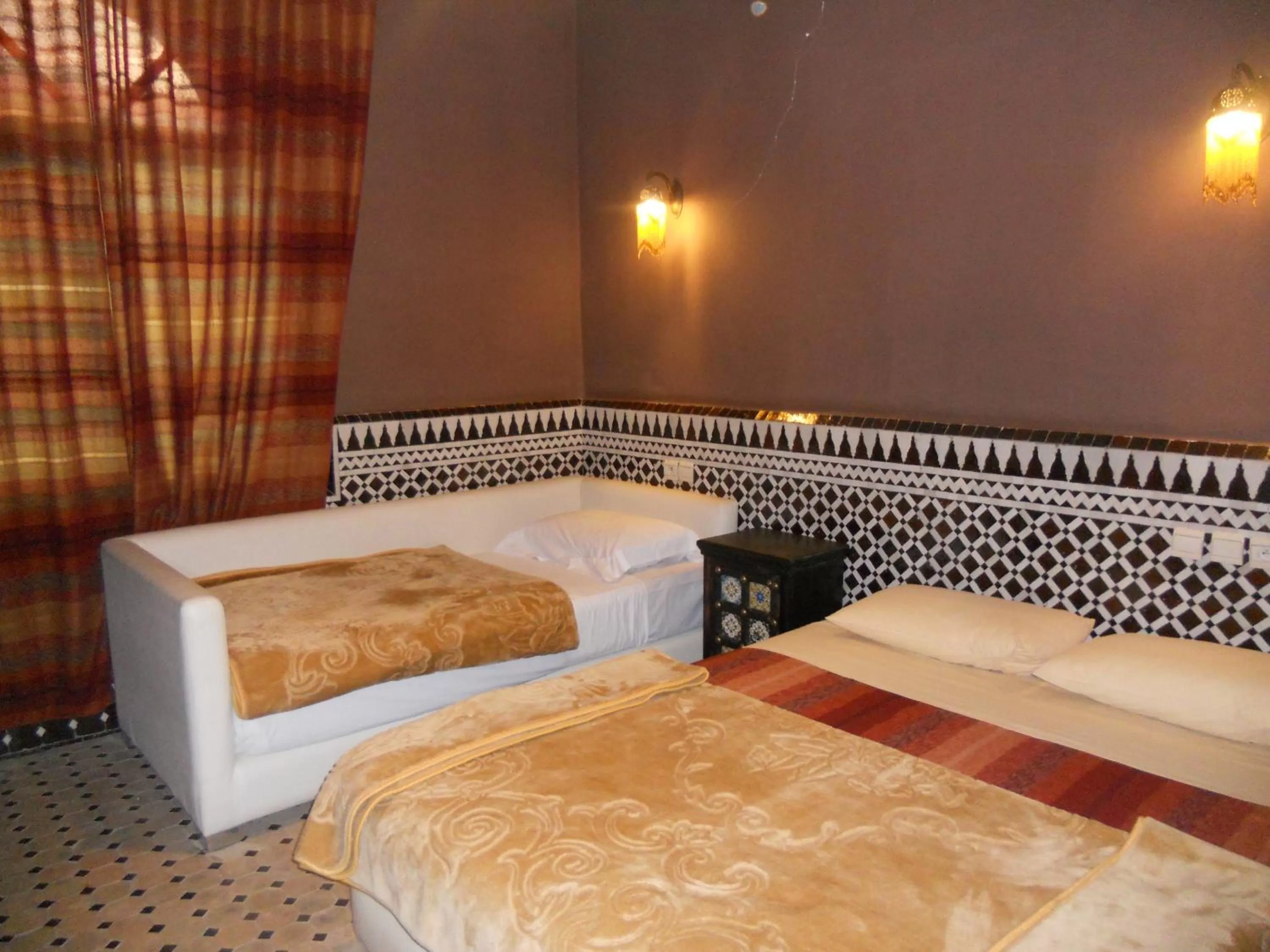 Bed in Riad Passiflora