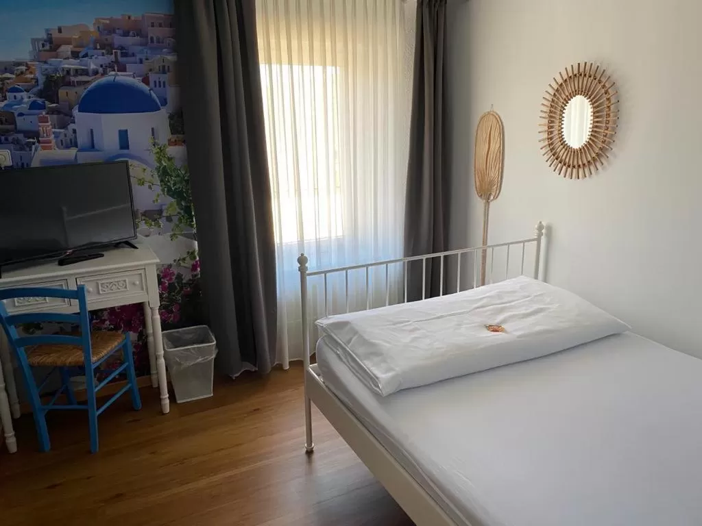 Bed in Boutique-garni Hotel Papillon