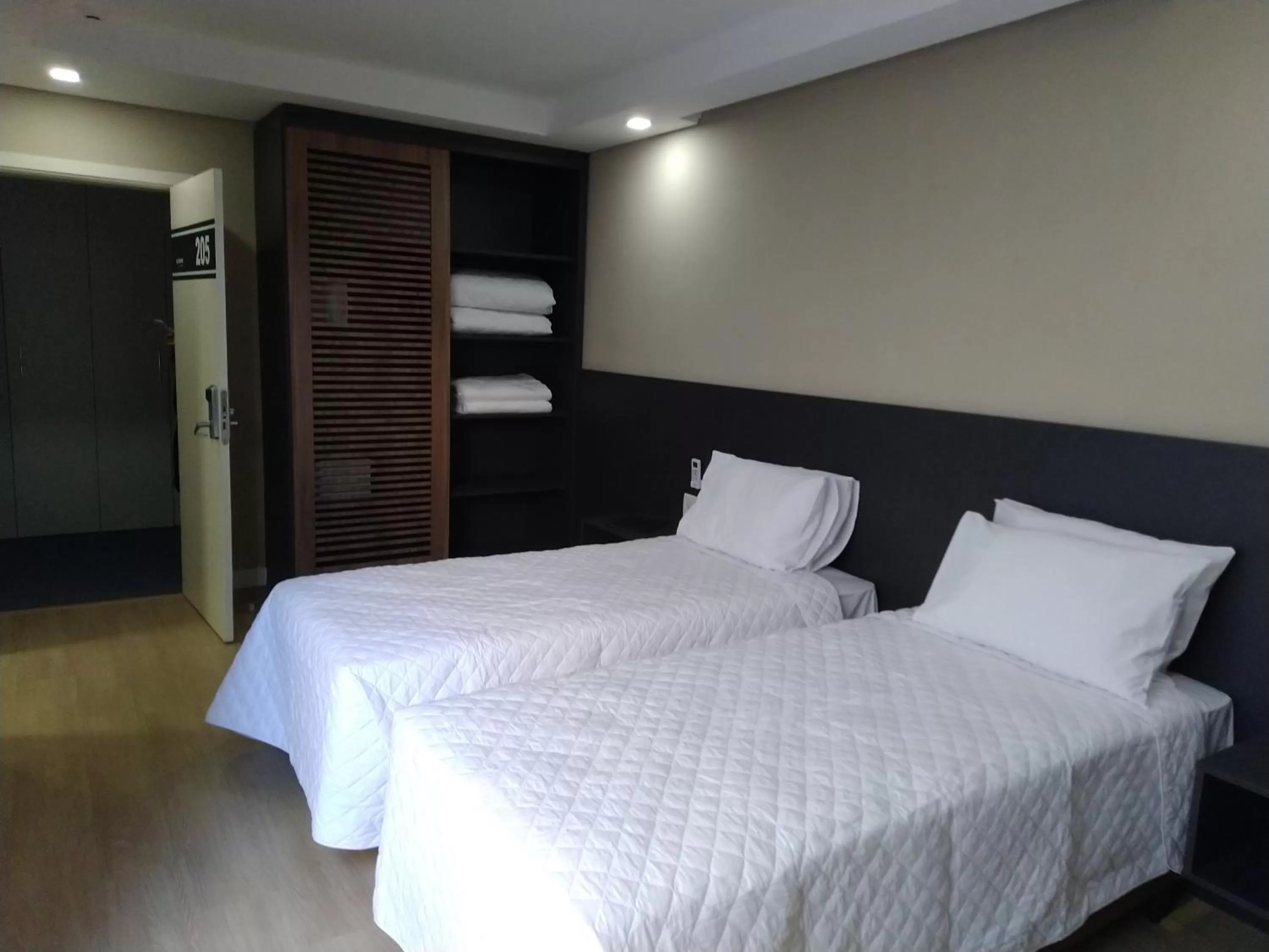 Bed in M Tower Hotel