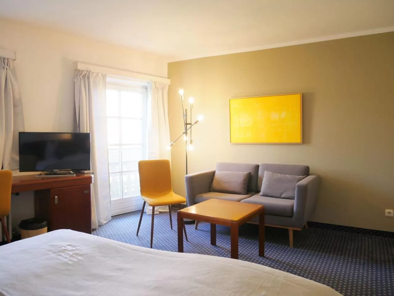 Communal lounge/ TV room, Bed in Stadthaus Valentin