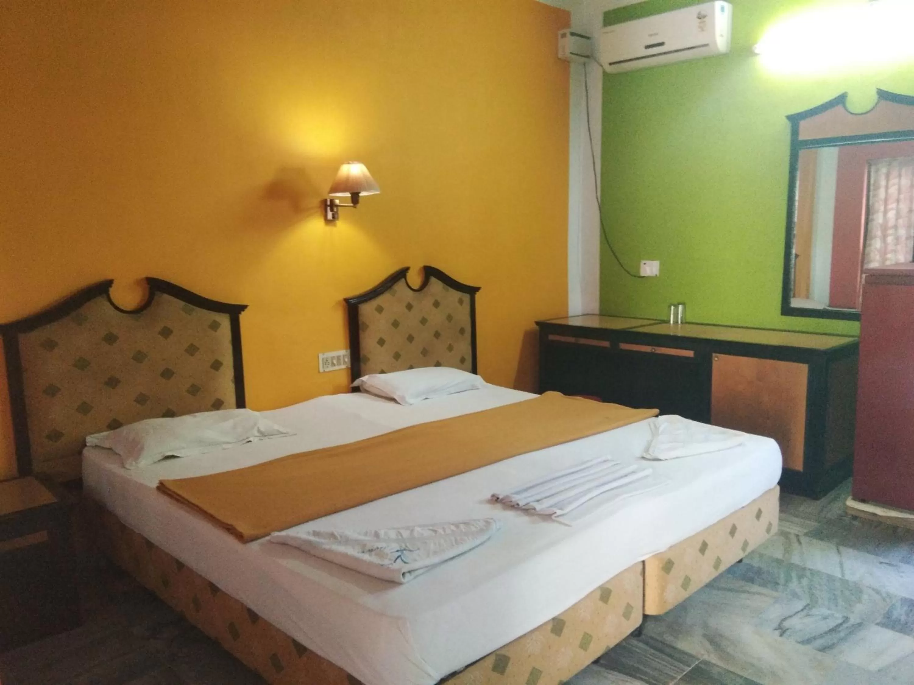 Bed in Wilson Ayurvedic Beach Resorts