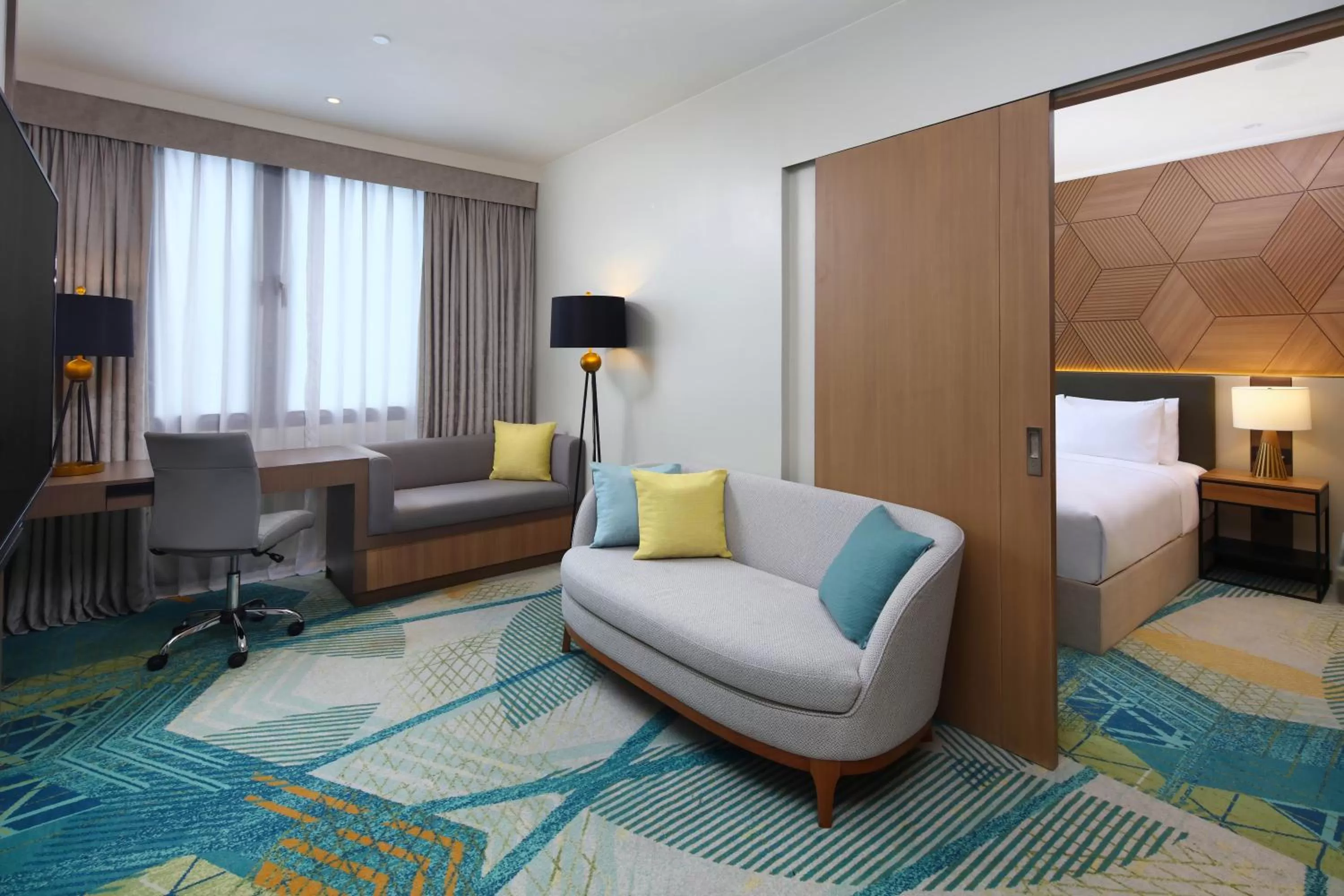 Living room, Bed in Holiday Inn Cebu City by IHG
